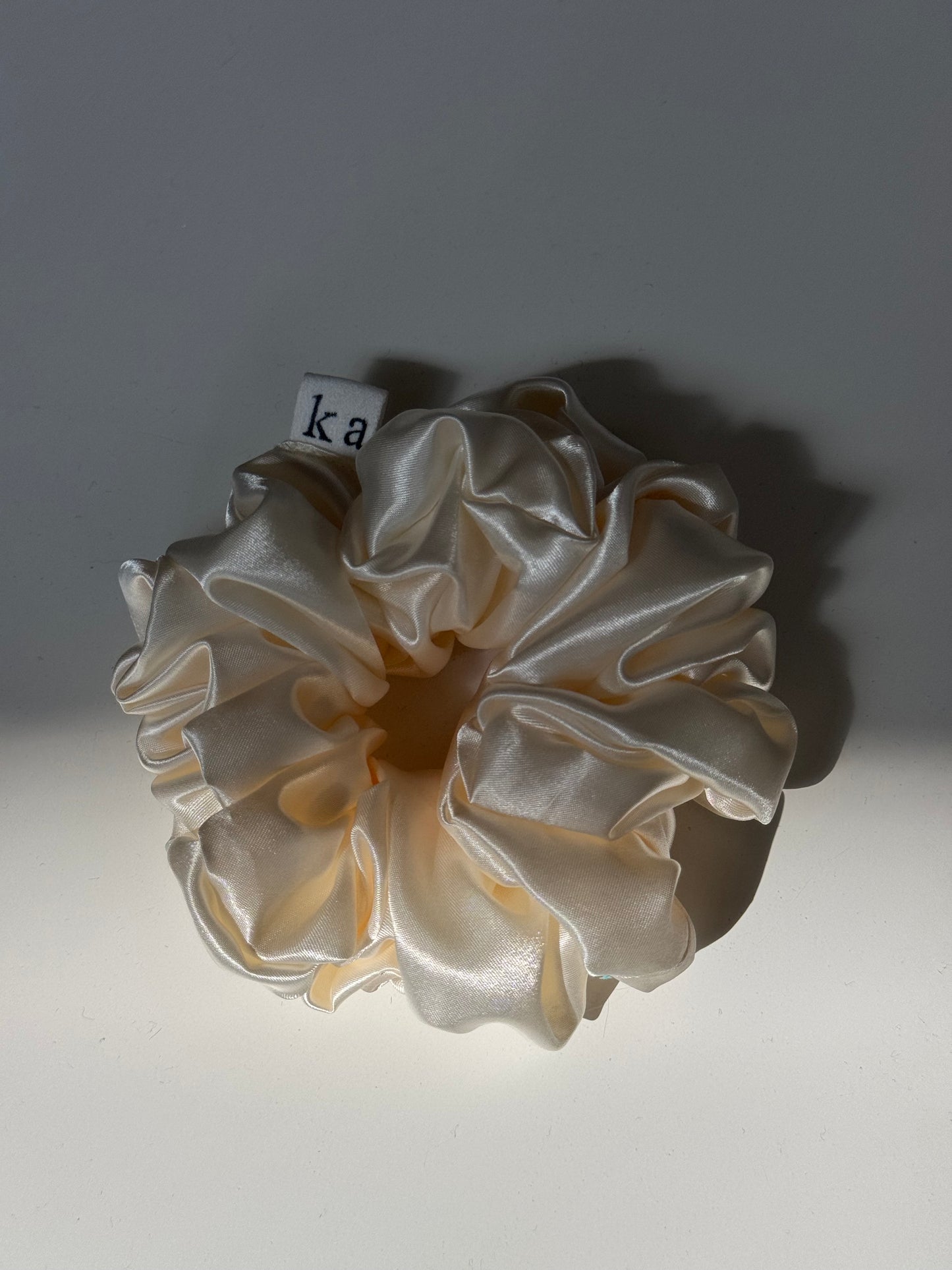Judy Handcrafted Texas Sized Satin Scrunchie In Champagne