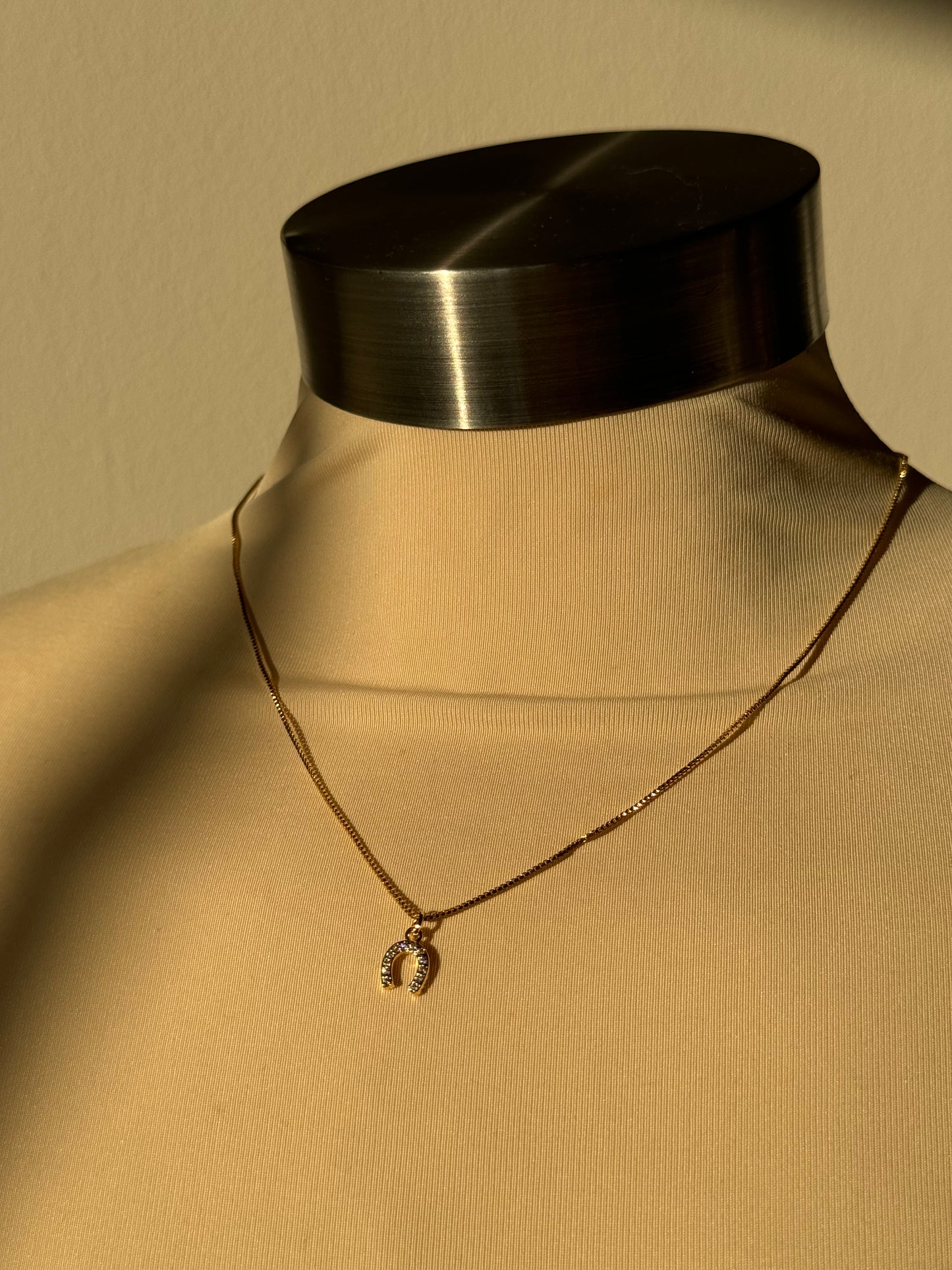 Horseshoe Mini Charm Necklace In Gold