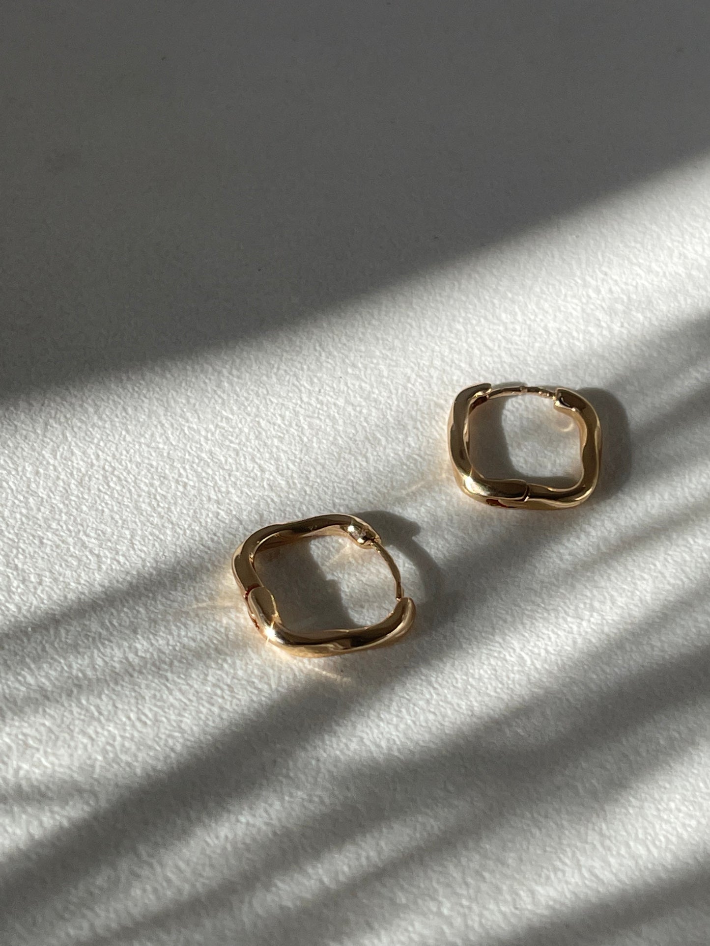 Kirsten Twist Stainless Steel Hug Hoop Earring In Gold