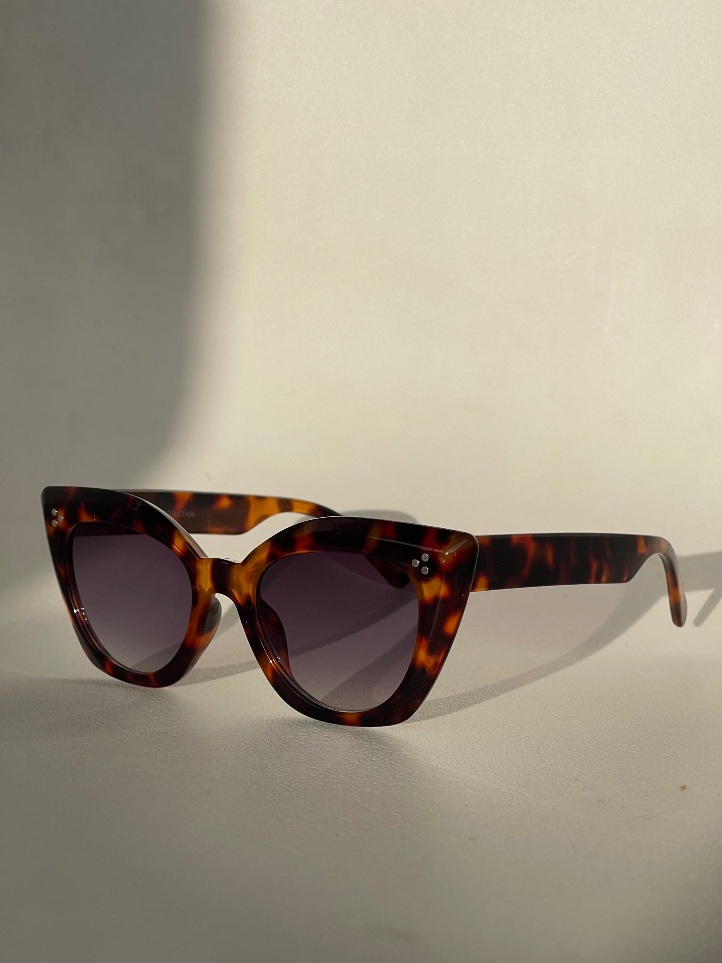 Charlie Triple Stud Cat Eye Sunglasses In Tortoise