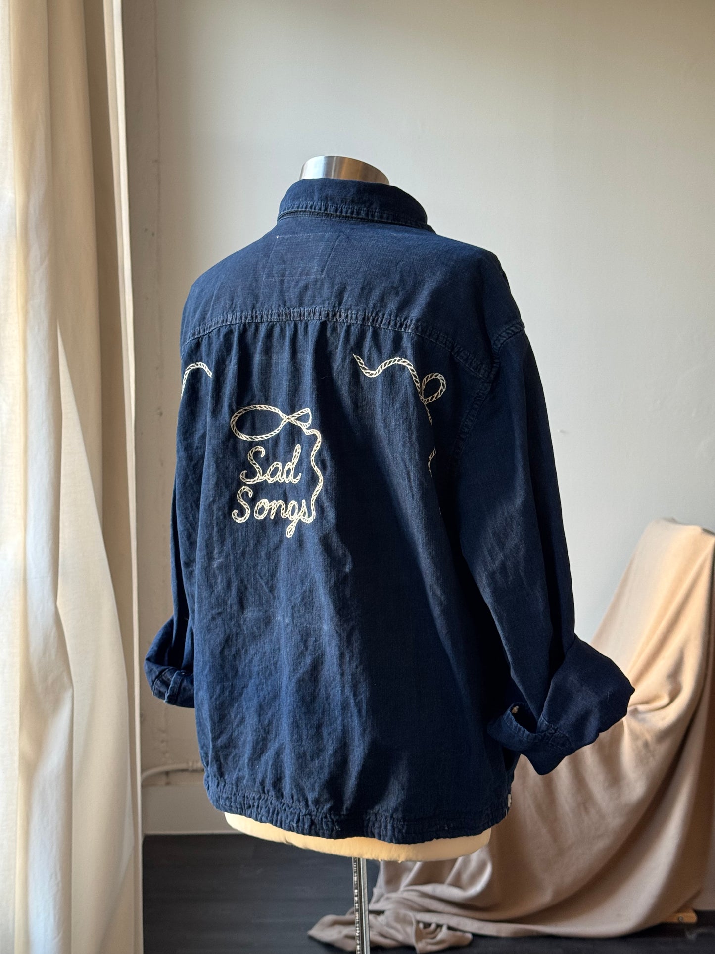 The Lawrence Handcrafted Sad Songs Cropped Cotton Button Down Long Sleeve