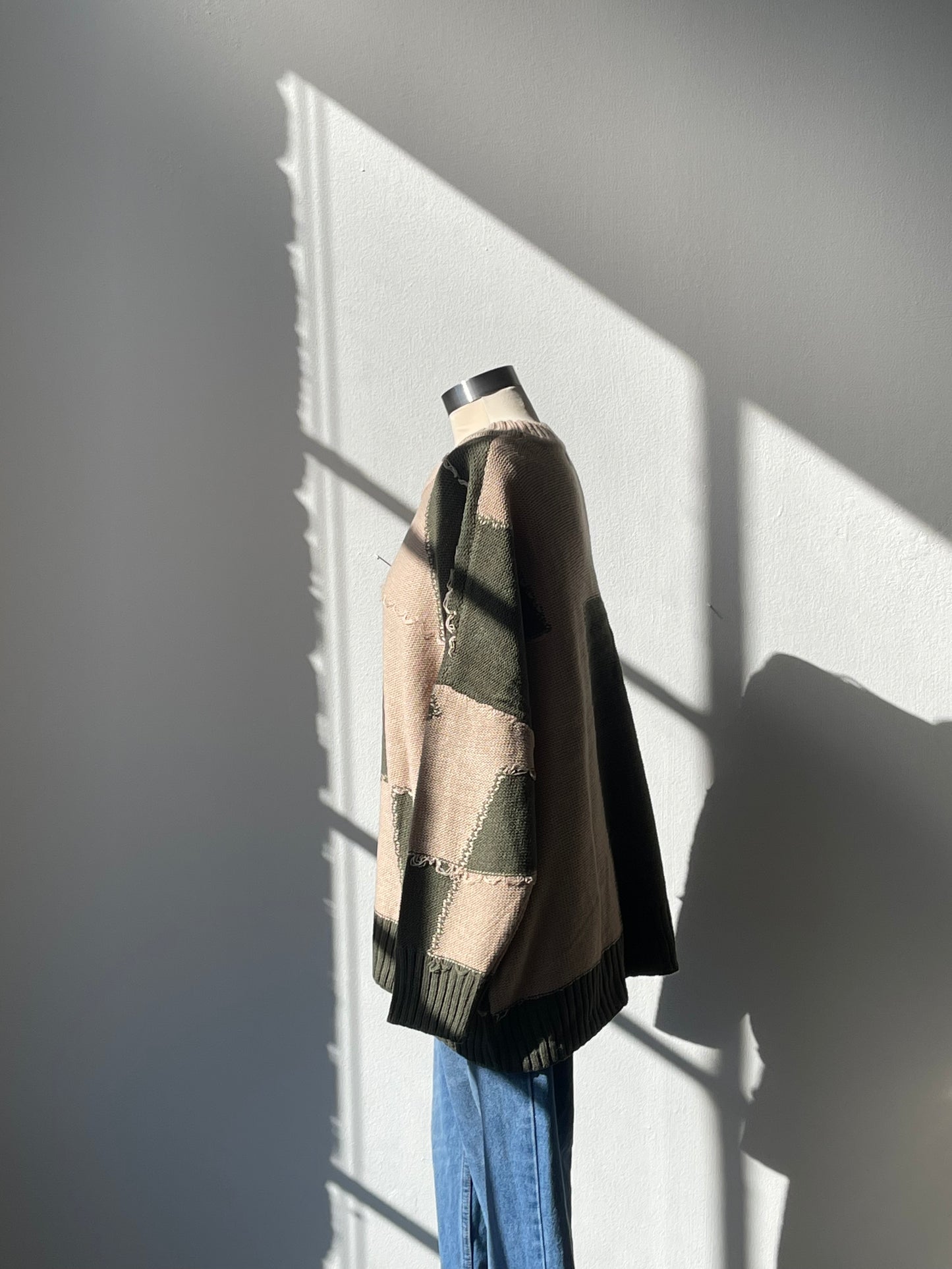 Nico Distressed Color Block Sweater In Taupe Olive