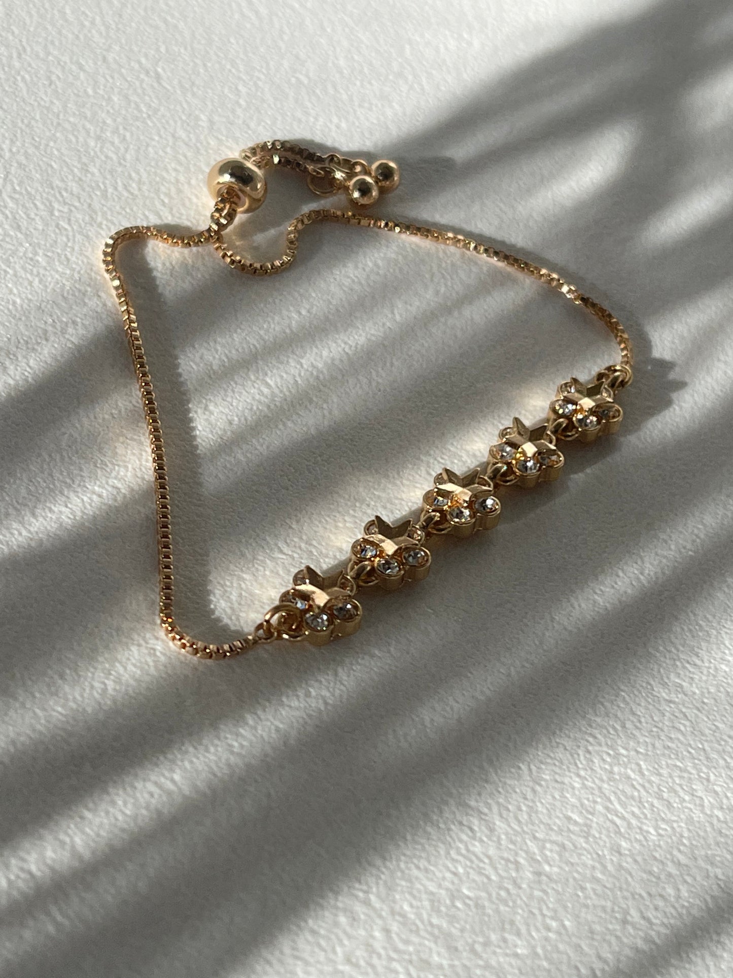 Charlie Stainless Steel Star & Charm Bracelet In Gold