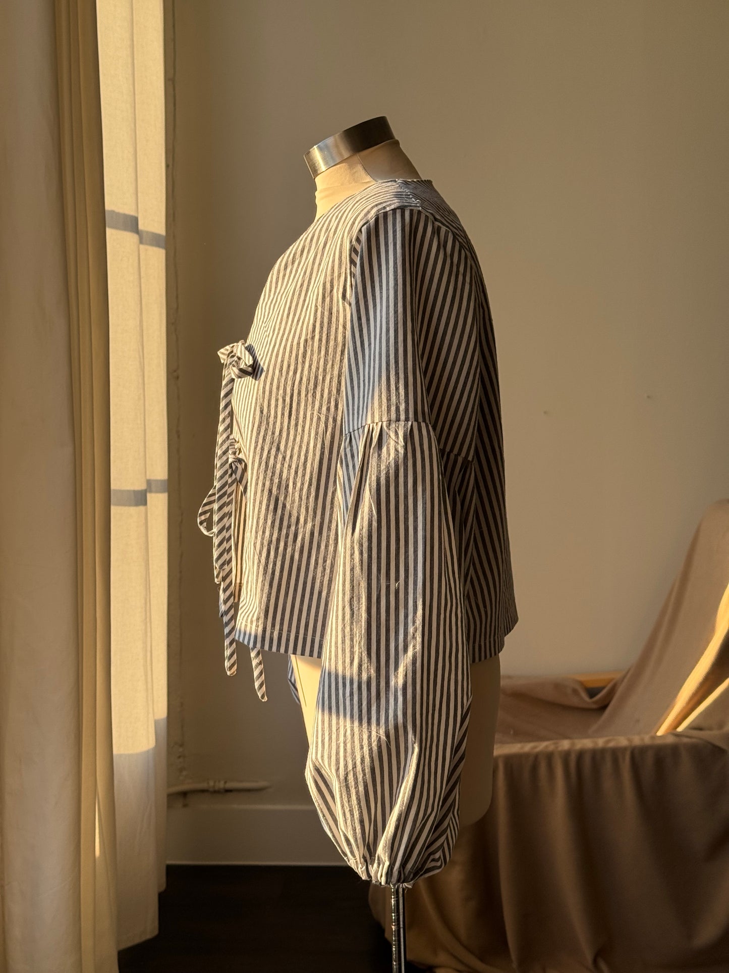 Brenda Faye Handcrafted Striped Lantern Sleeve Tie Front Top an Ash Black