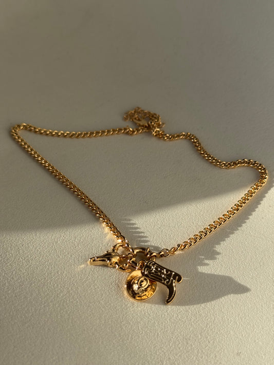Delilah Hat Boot & Skull Charm Necklace In Gold