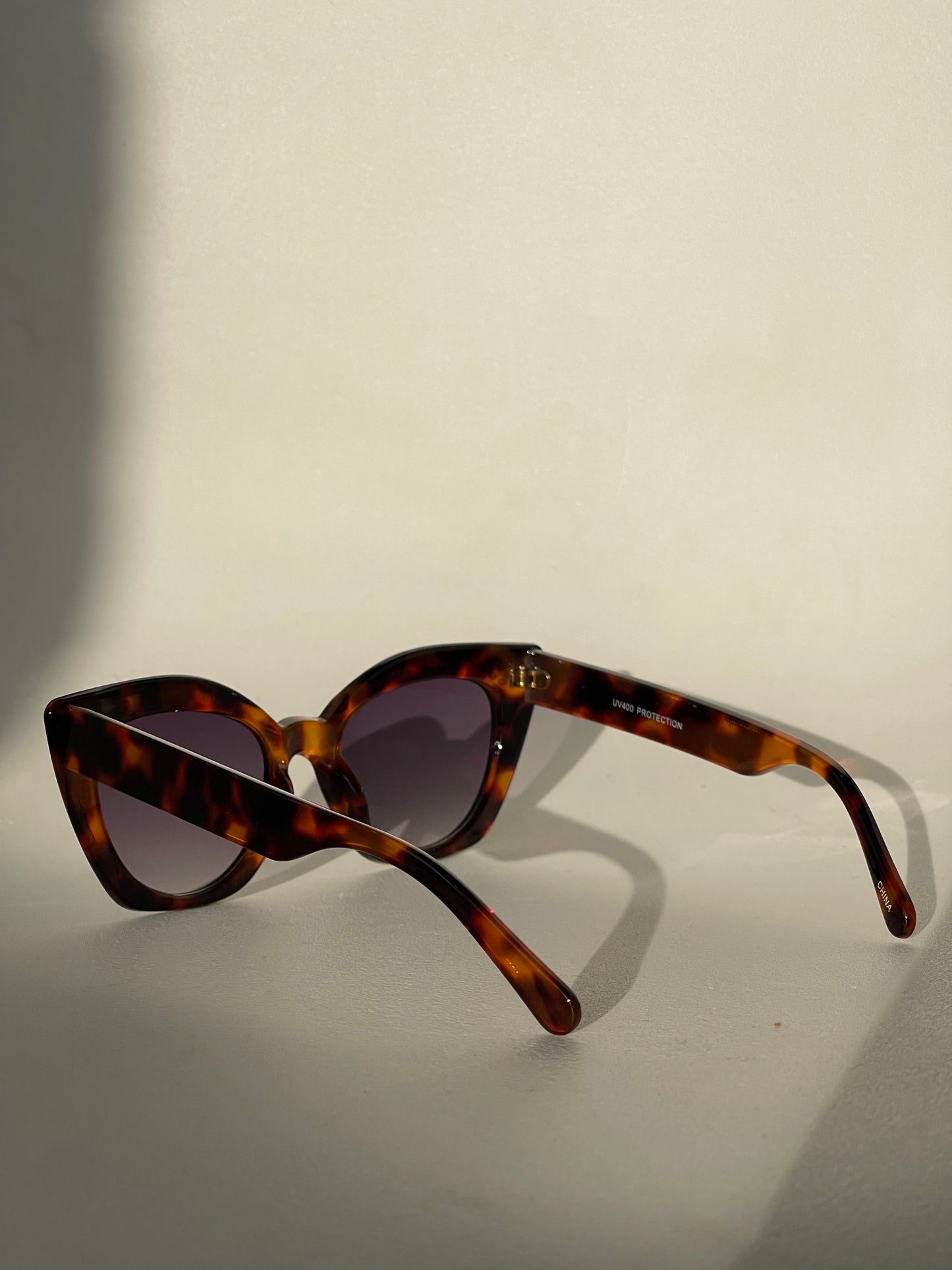 Charlie Triple Stud Cat Eye Sunglasses In Tortoise