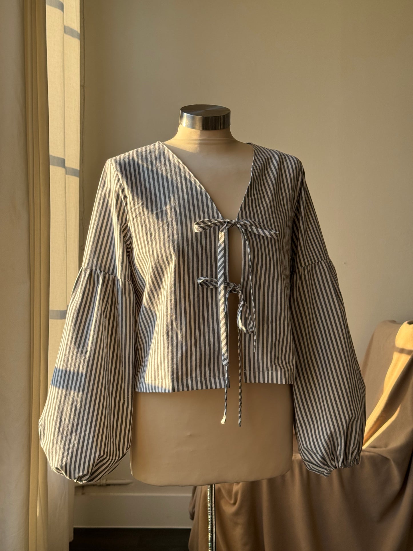 Brenda Faye Handcrafted Striped Lantern Sleeve Tie Front Top an Ash Black
