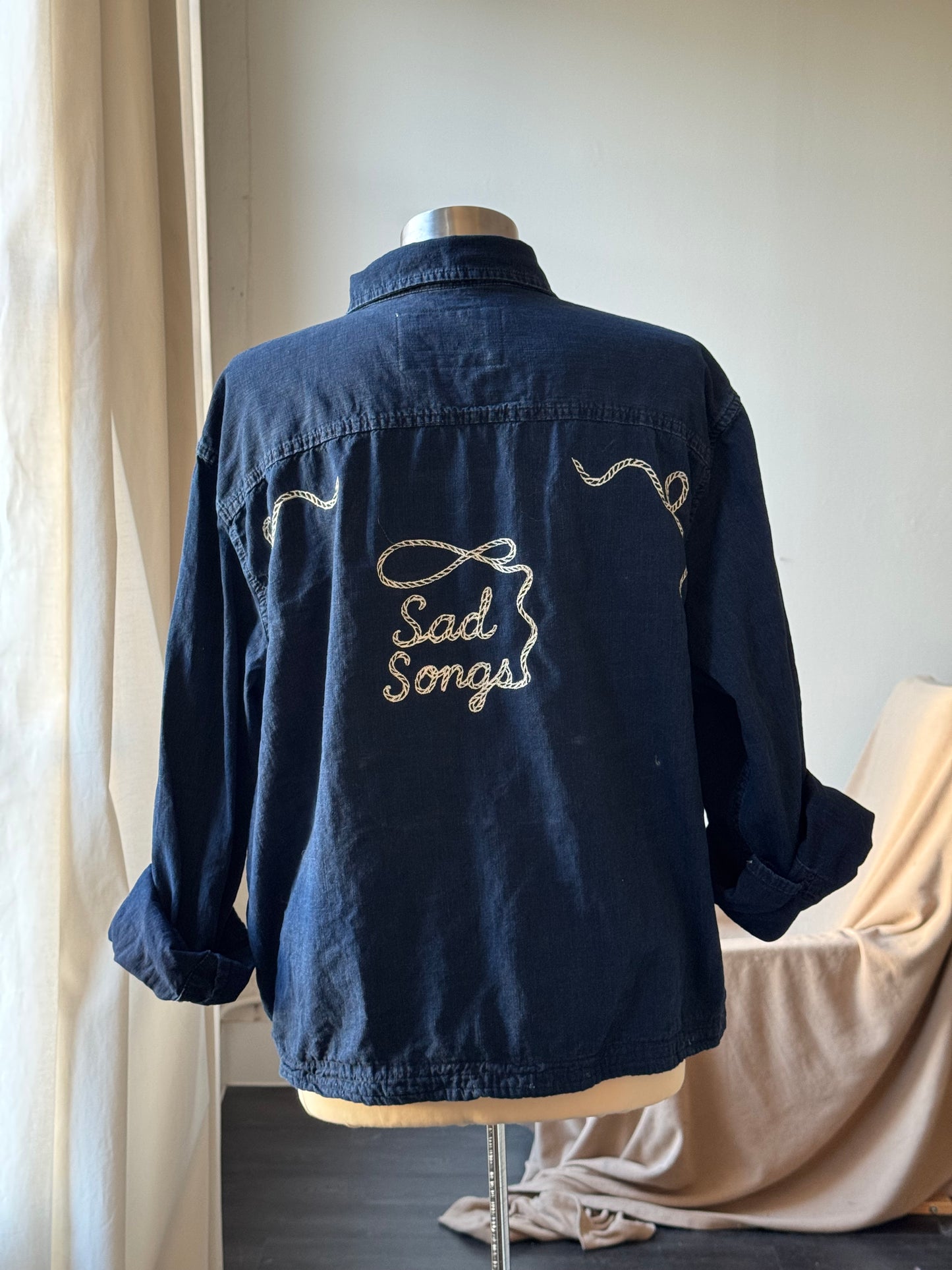 The Lawrence Handcrafted Sad Songs Cropped Cotton Button Down Long Sleeve