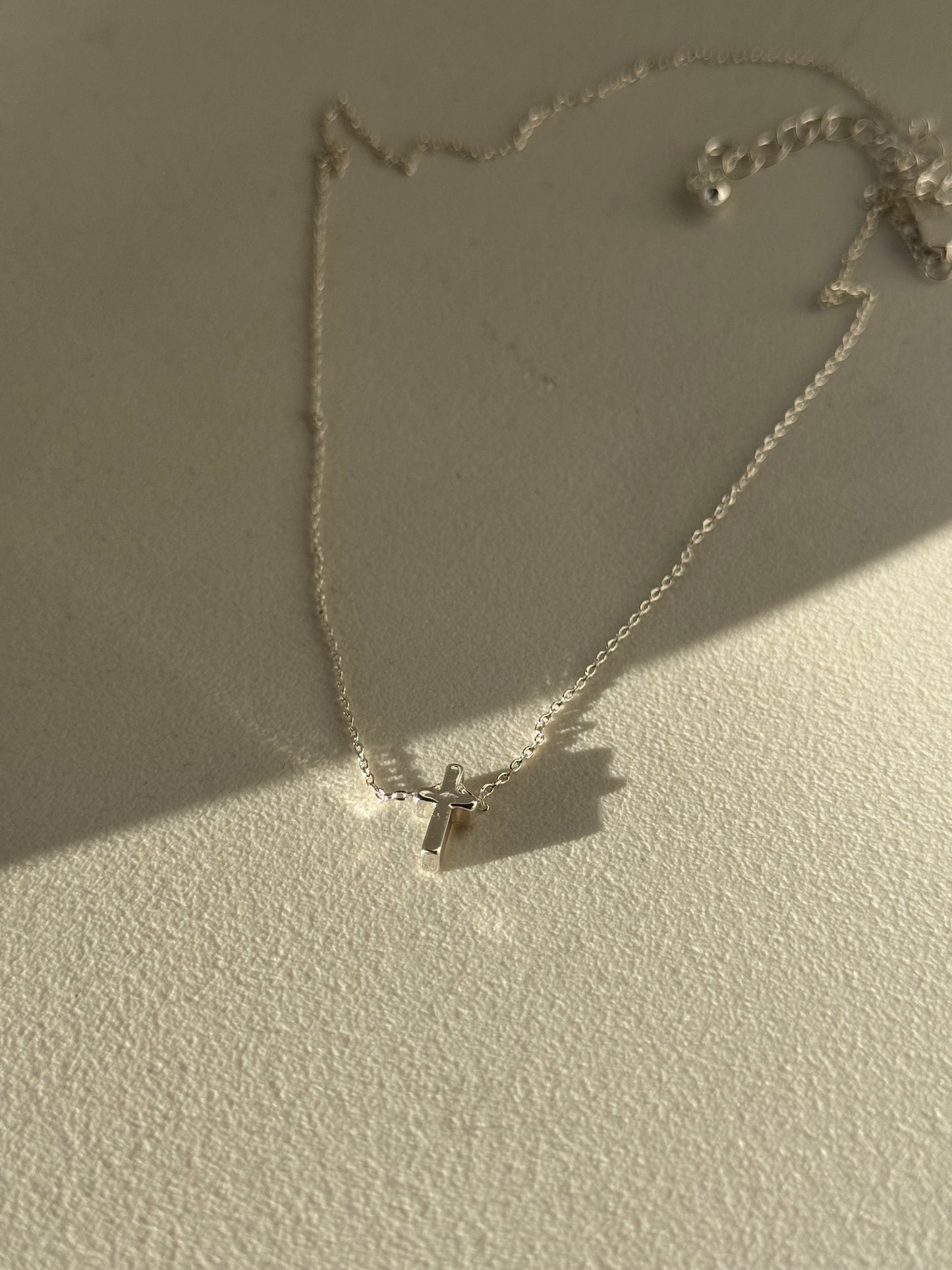 April Mini Cross Necklace in Silver