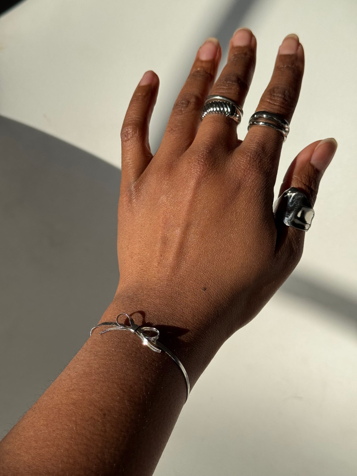 Kinsley Herringbone Chain Stainless Steel Bow Bracelet in Antique Silver