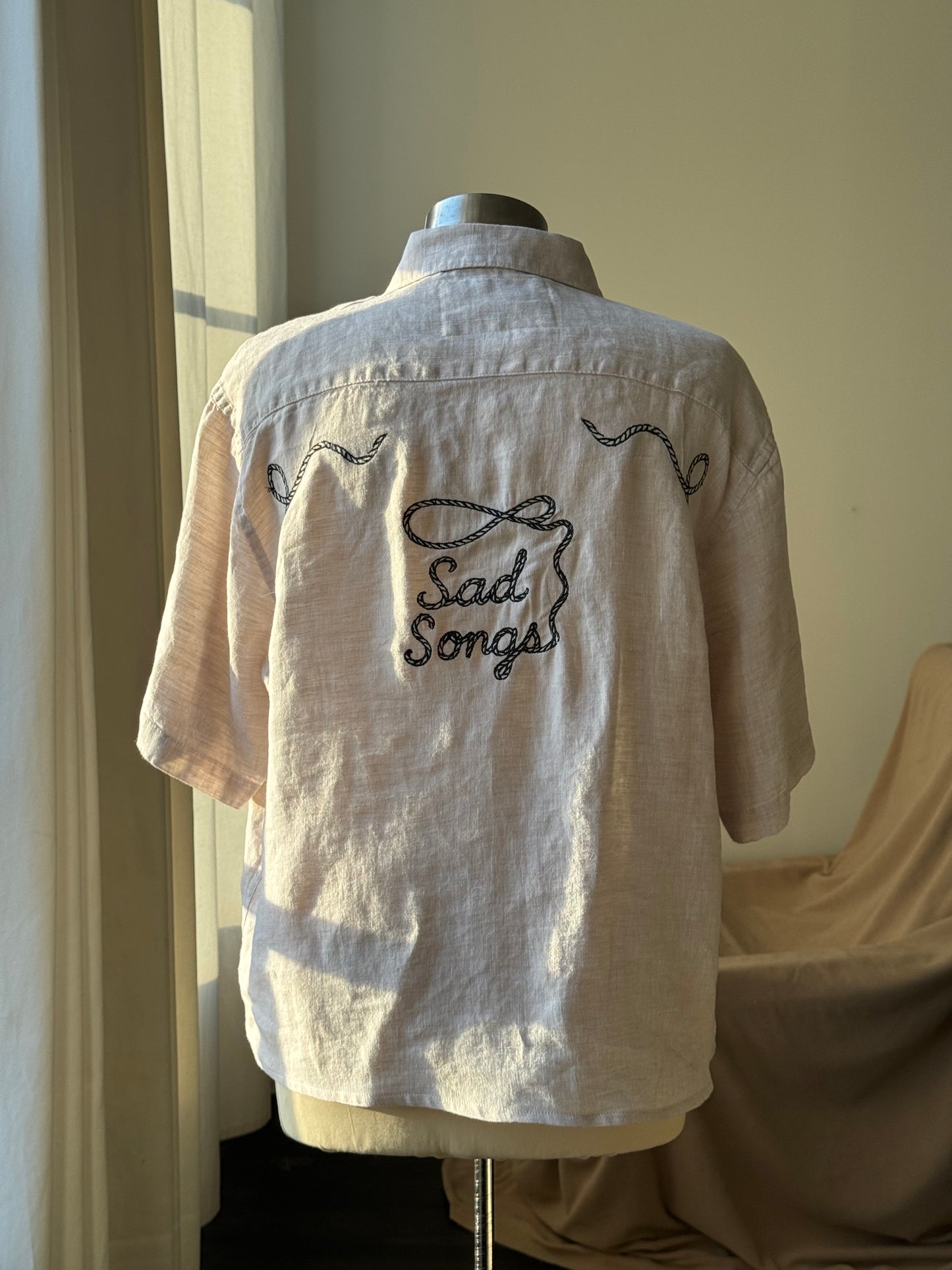Judy Handcrafted Sad Songs Cropped Linen Button Down Short Sleeve In Natural