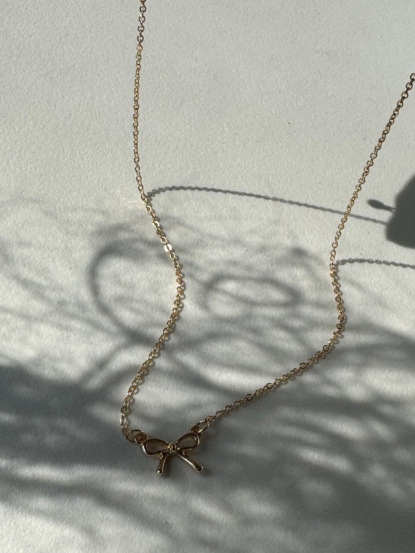 Bonnie’s Bow Mini Necklace In Gold