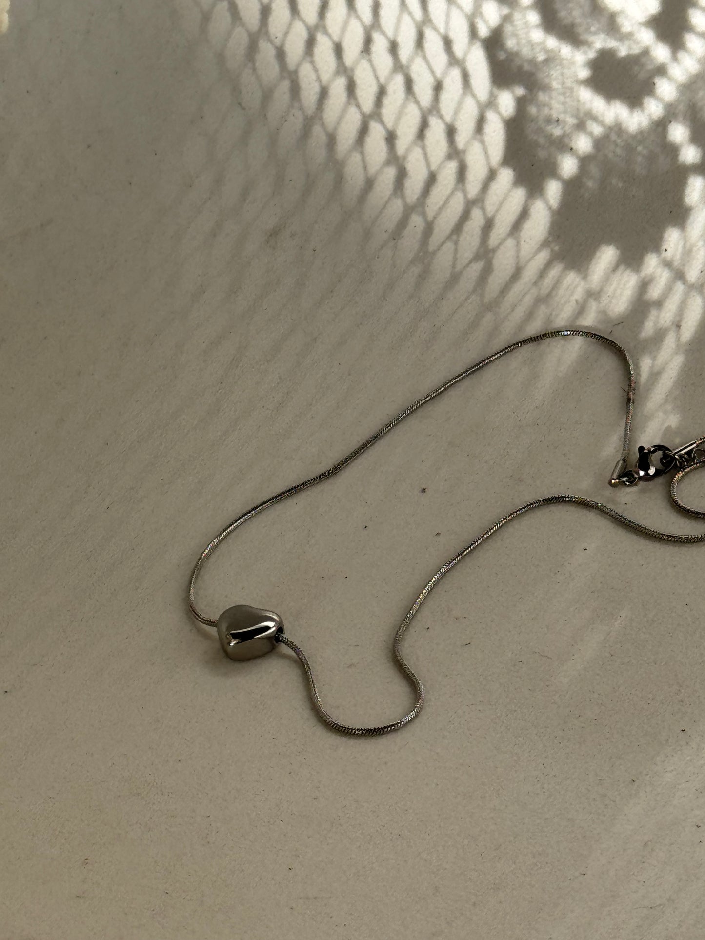 Sandy 18k Stainless Steel Waterproof Heart Charm Necklace In White Gold Silver
