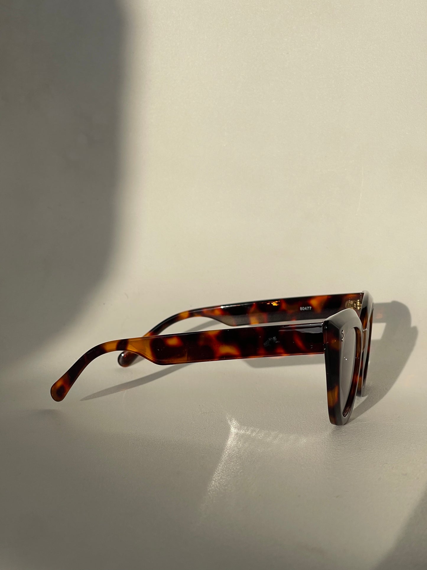 Charlie Triple Stud Cat Eye Sunglasses In Tortoise