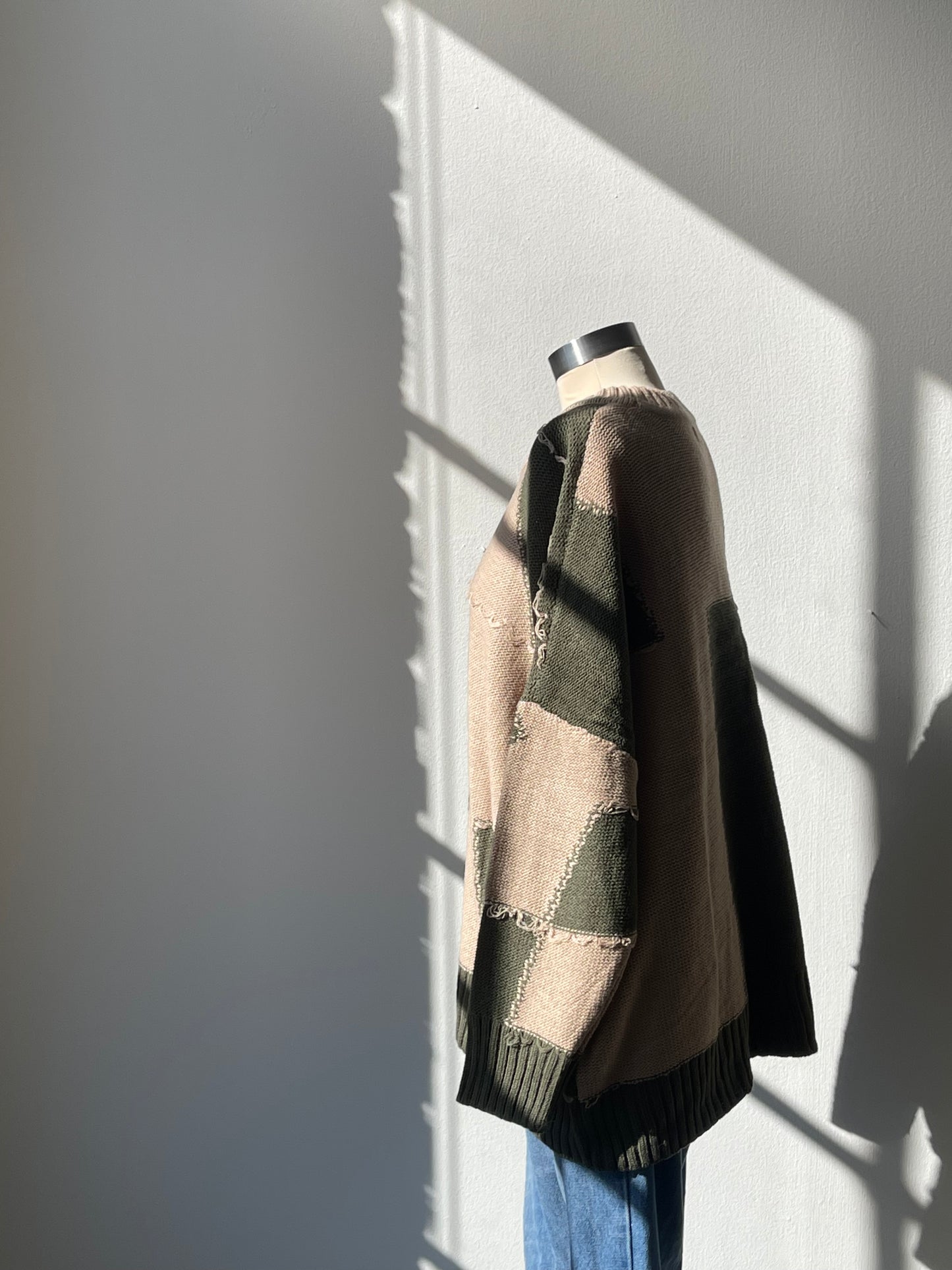 Nico Distressed Color Block Sweater In Taupe Olive