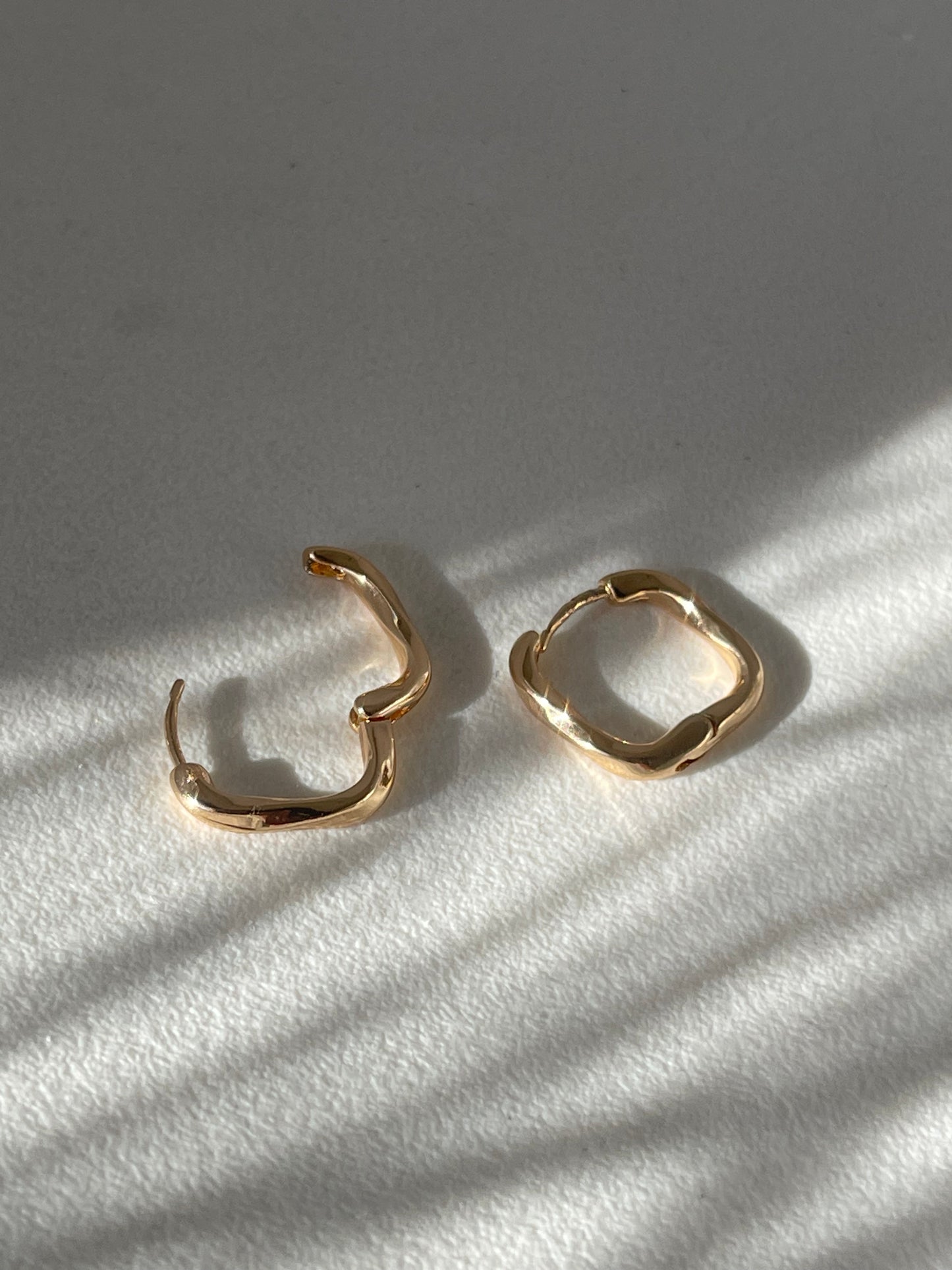 Kirsten Twist Stainless Steel Hug Hoop Earring In Gold