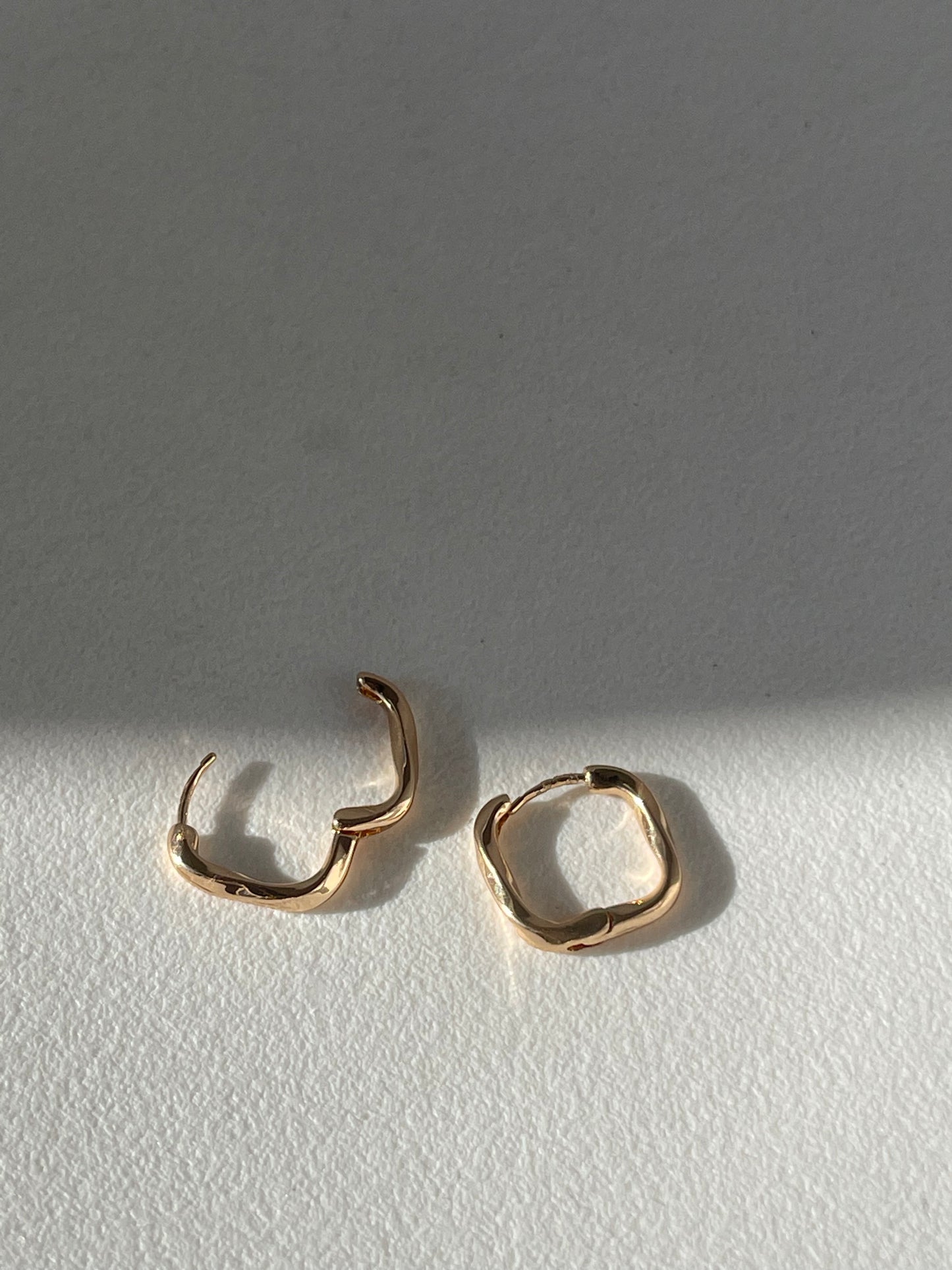 Kirsten Twist Stainless Steel Hug Hoop Earring In Gold