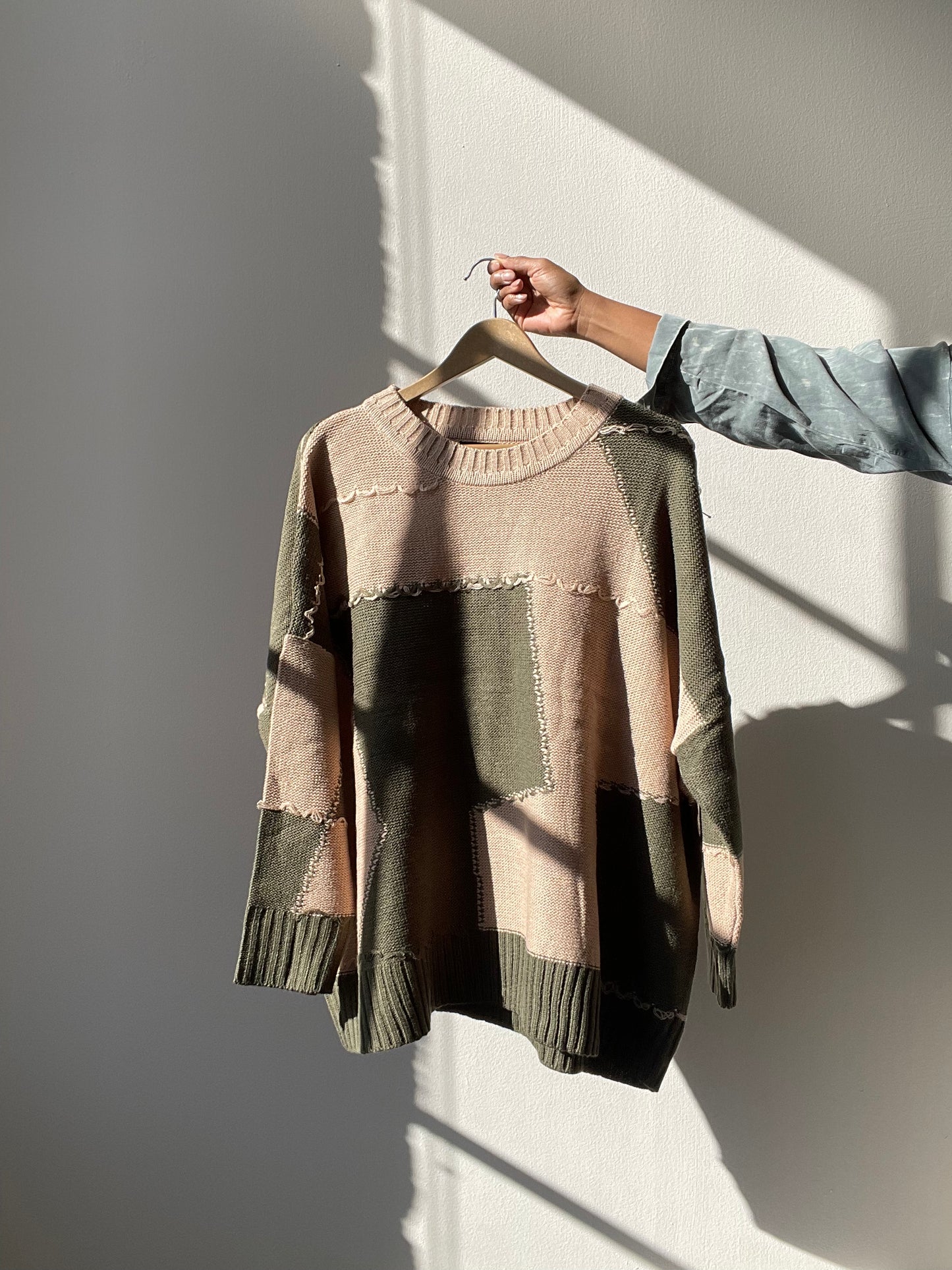 Nico Distressed Color Block Sweater In Taupe Olive