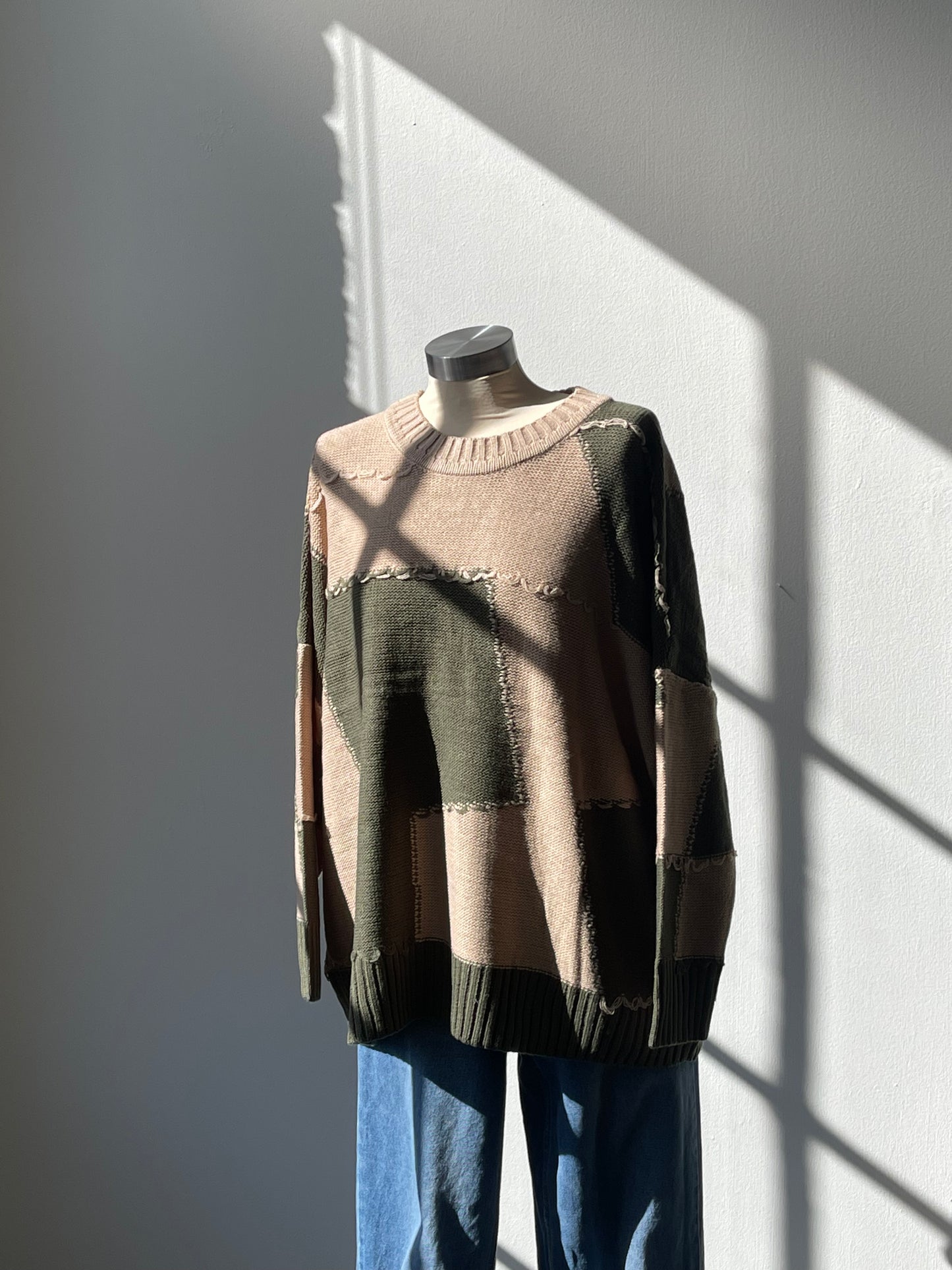 Nico Distressed Color Block Sweater In Taupe Olive
