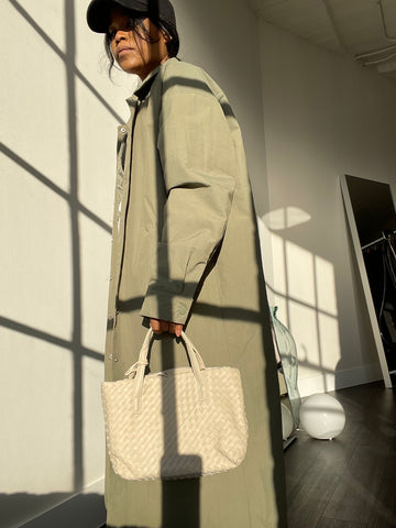 Marge Vegan Leather Woven Makeup Bag In Cream