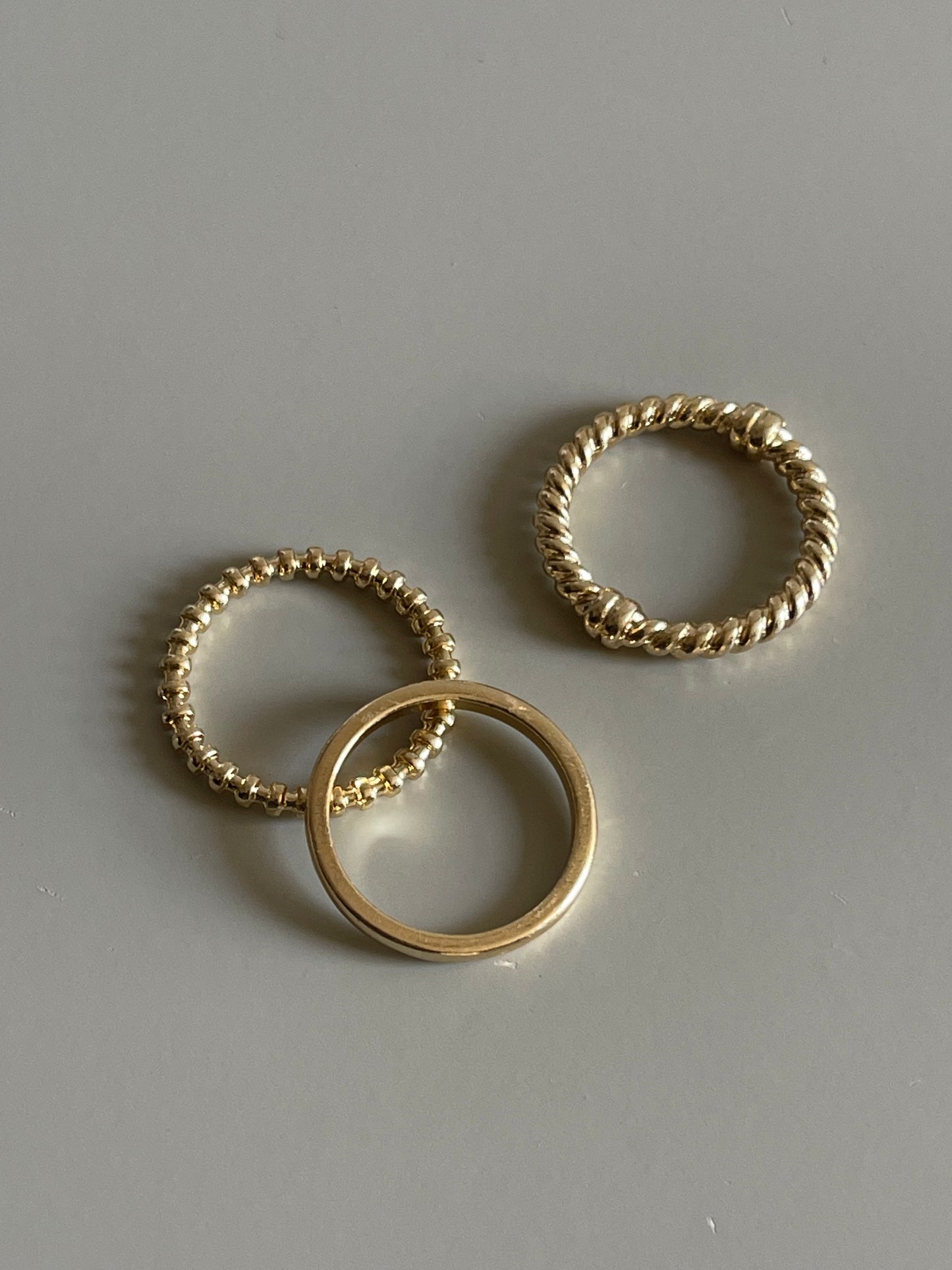 Tri Knot Twist & Band Ring Set In Gold