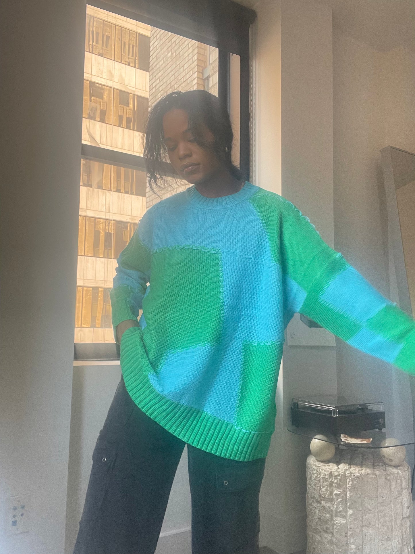 Nico Distressed Color Block Sweater In Teal Green