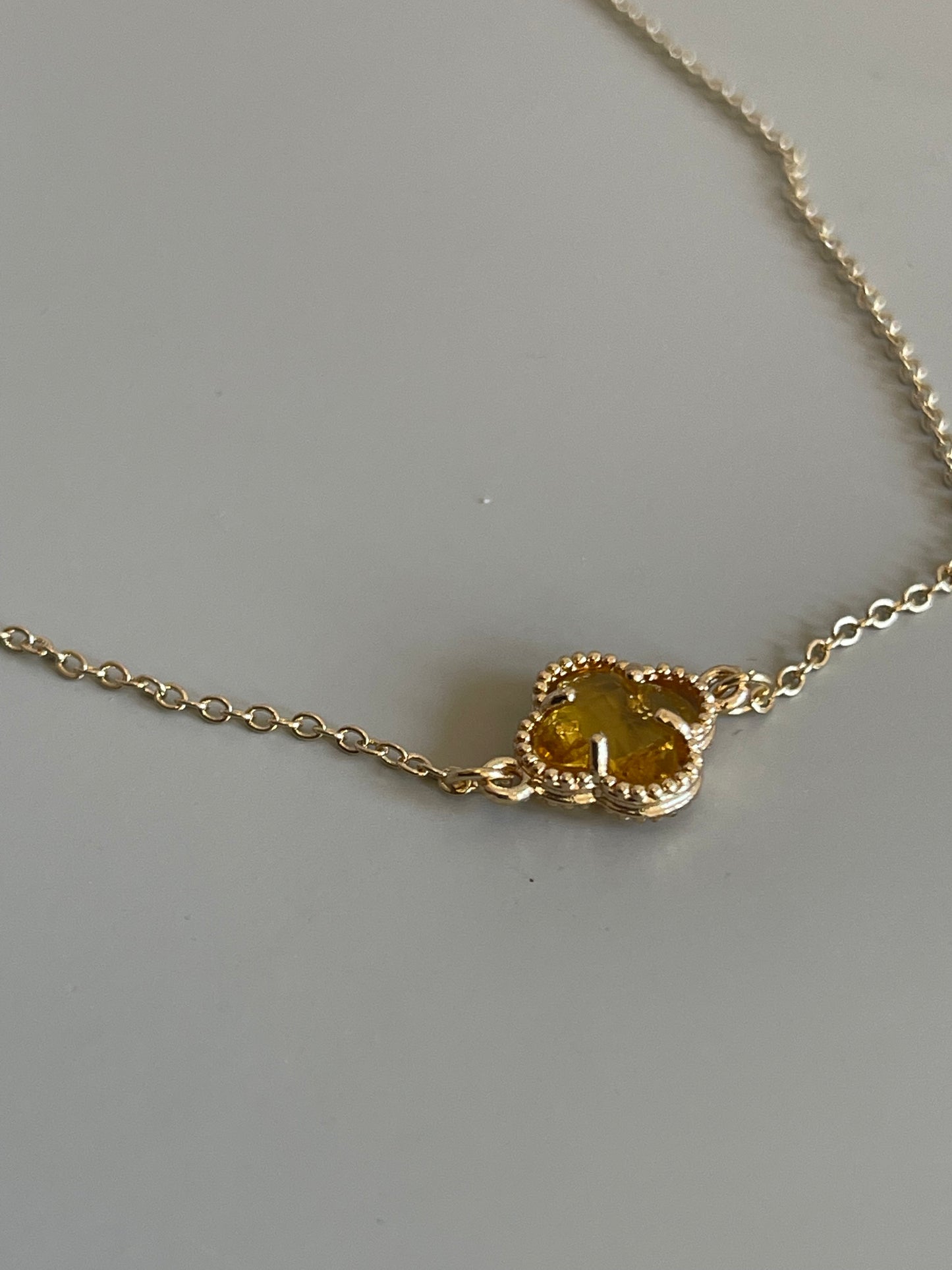 Clover Mini Charm Necklace In Champagne