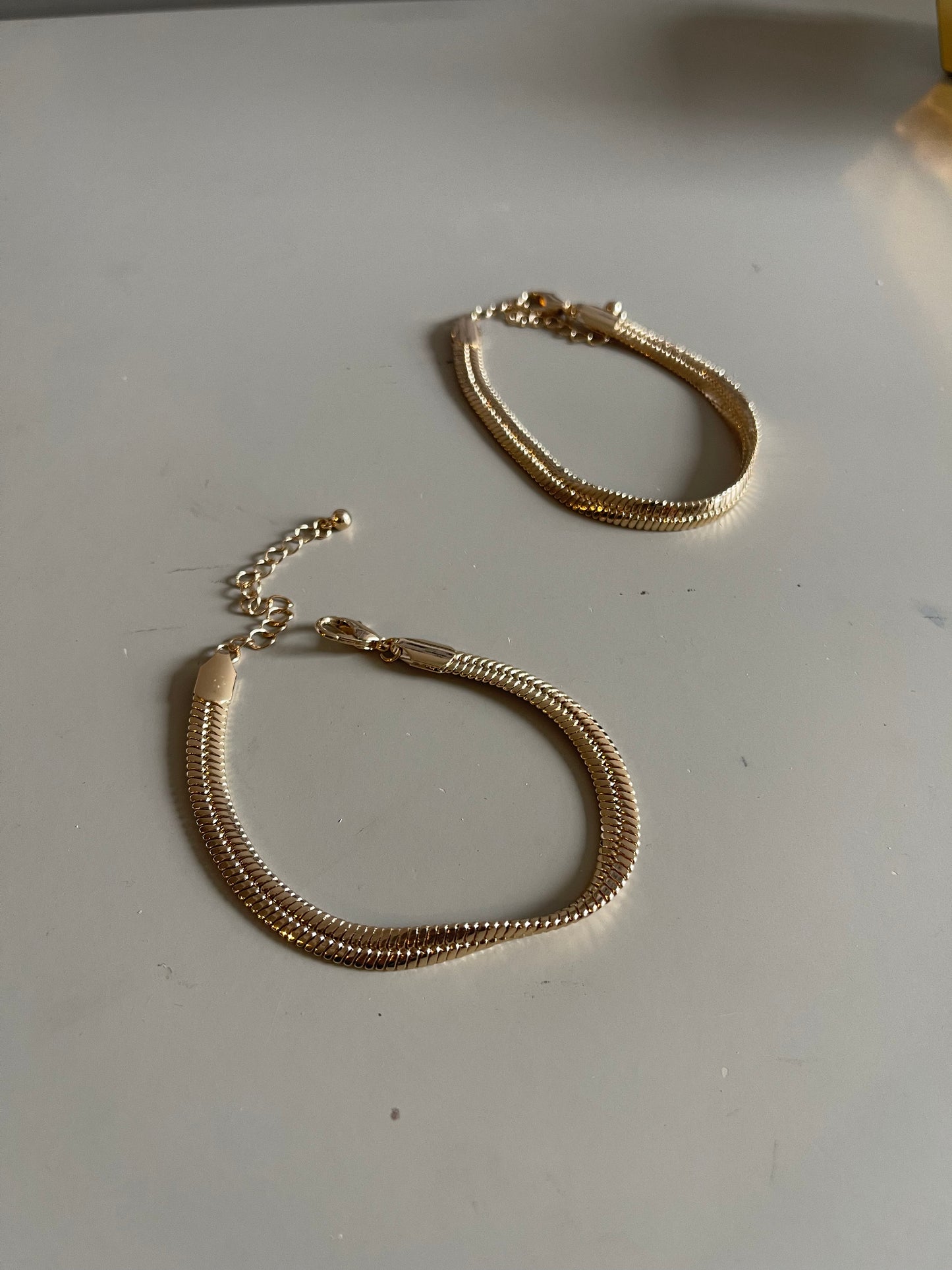 Flat Crum Snake Chain Bracelet Set In Gold