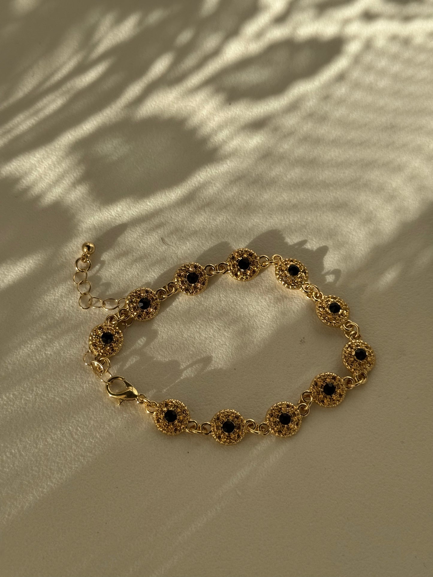 Phoebe Classic Ebony Stone Charm Bracelet In Gold￼