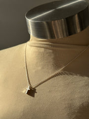 April Mini Cross Necklace in Silver