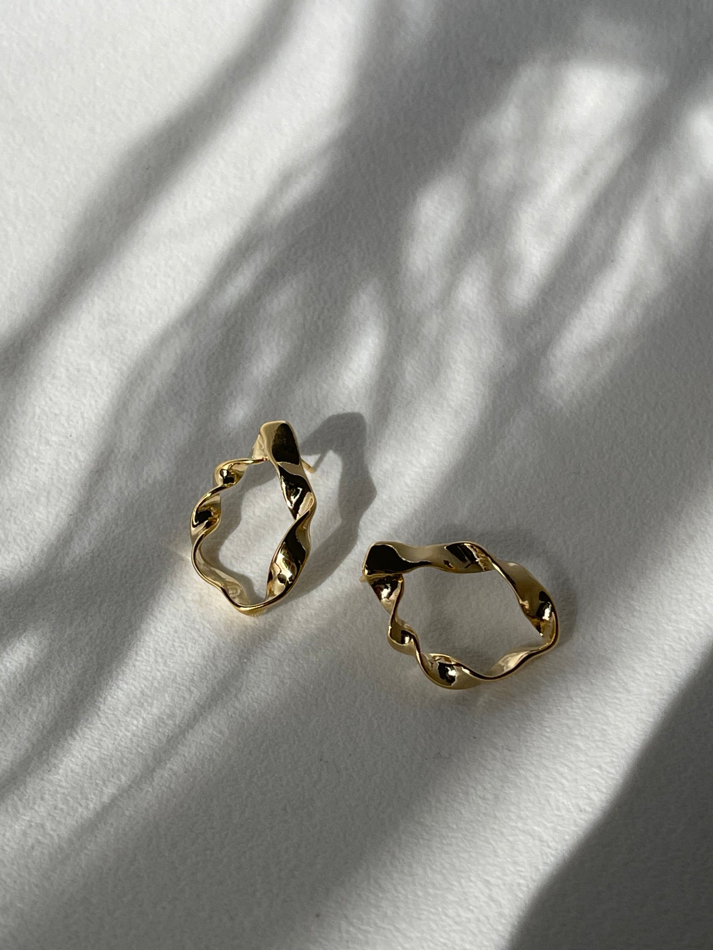 Organic Loose Twist Flat Hoop Earring In Gold