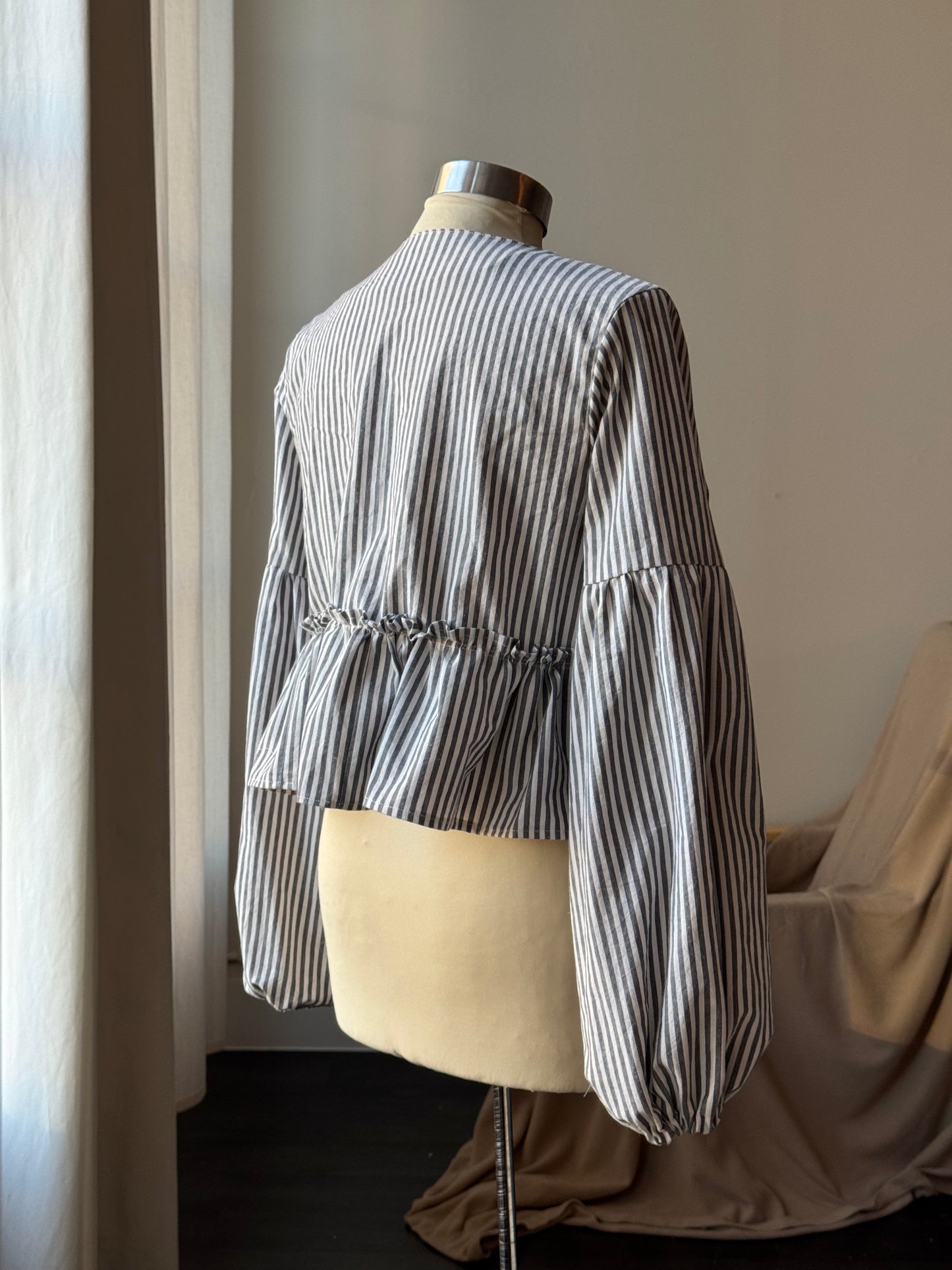 Florene Vintage Lantern Sleeve Ruffle Tie Front Top