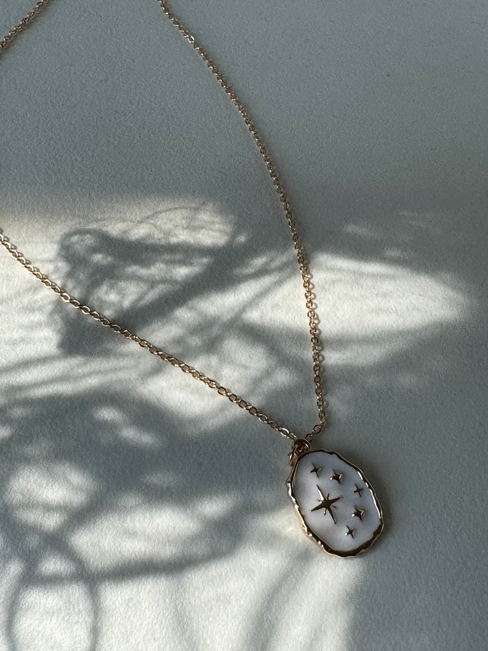 Organic Gold Rim Texas Stars Necklace In Ivory Gold