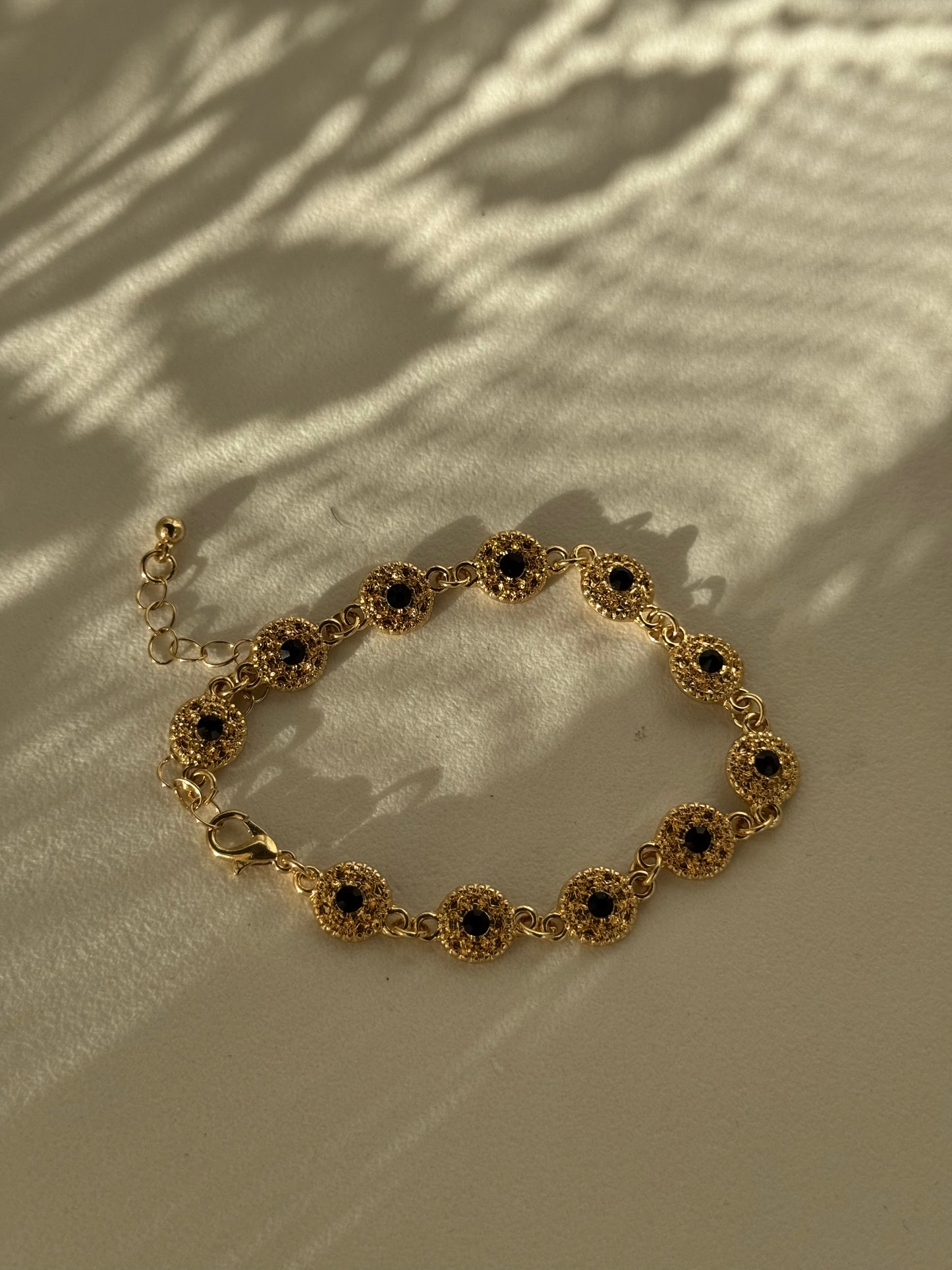 Phoebe Classic Ebony Stone Charm Bracelet In Gold￼