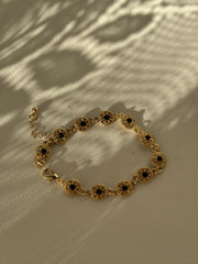 Phoebe Classic Ebony Stone Charm Bracelet In Gold