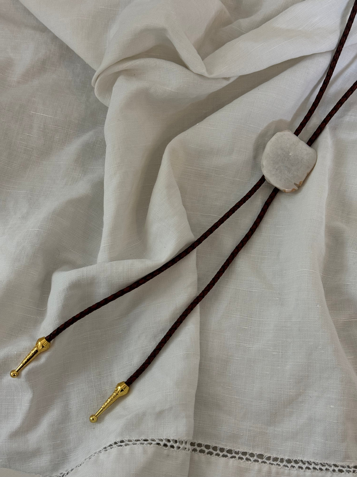 Handcrafted Agate Bolo Tie In Texas Snow