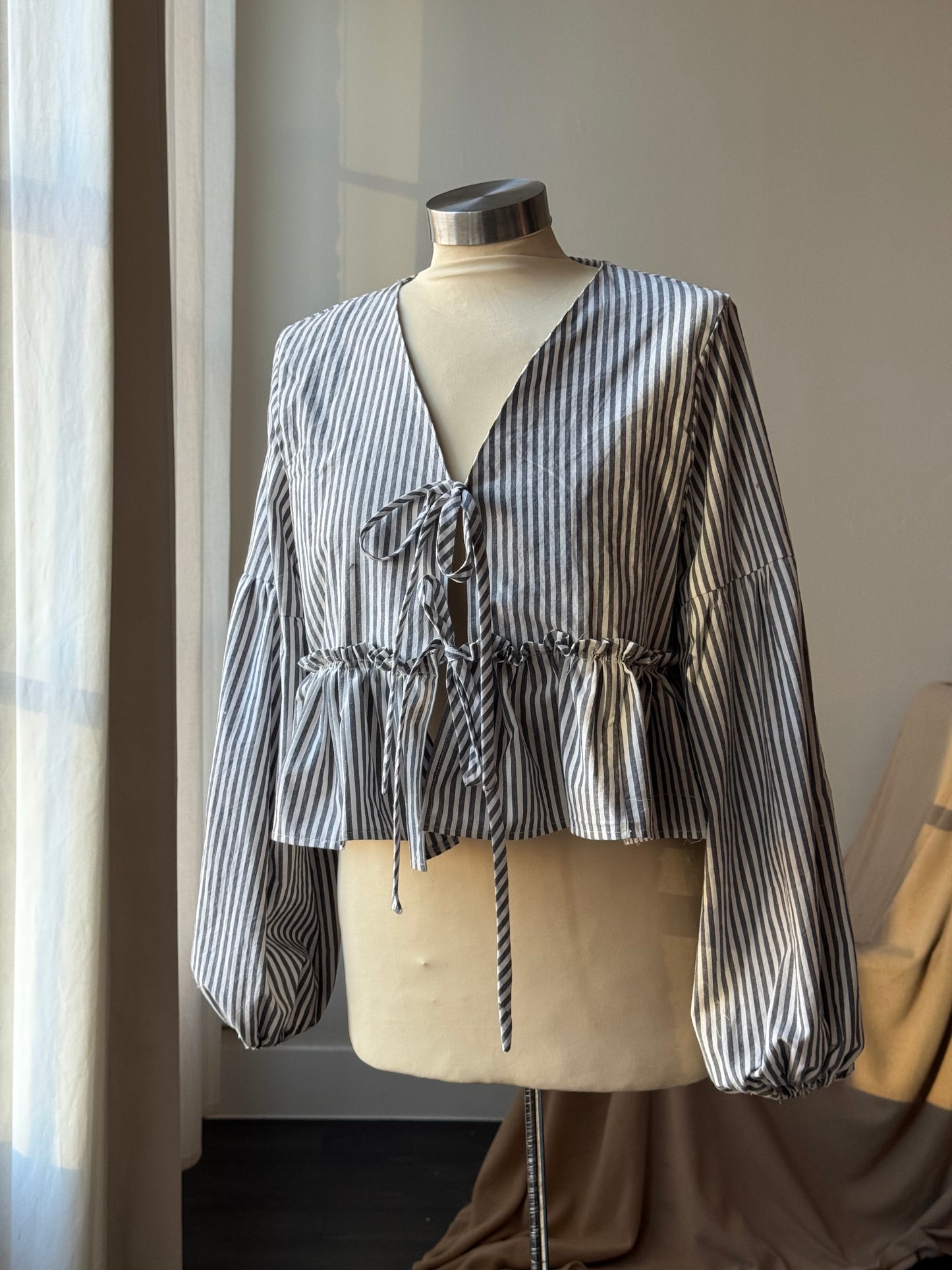 Florene Vintage Lantern Sleeve Ruffle Tie Front Top