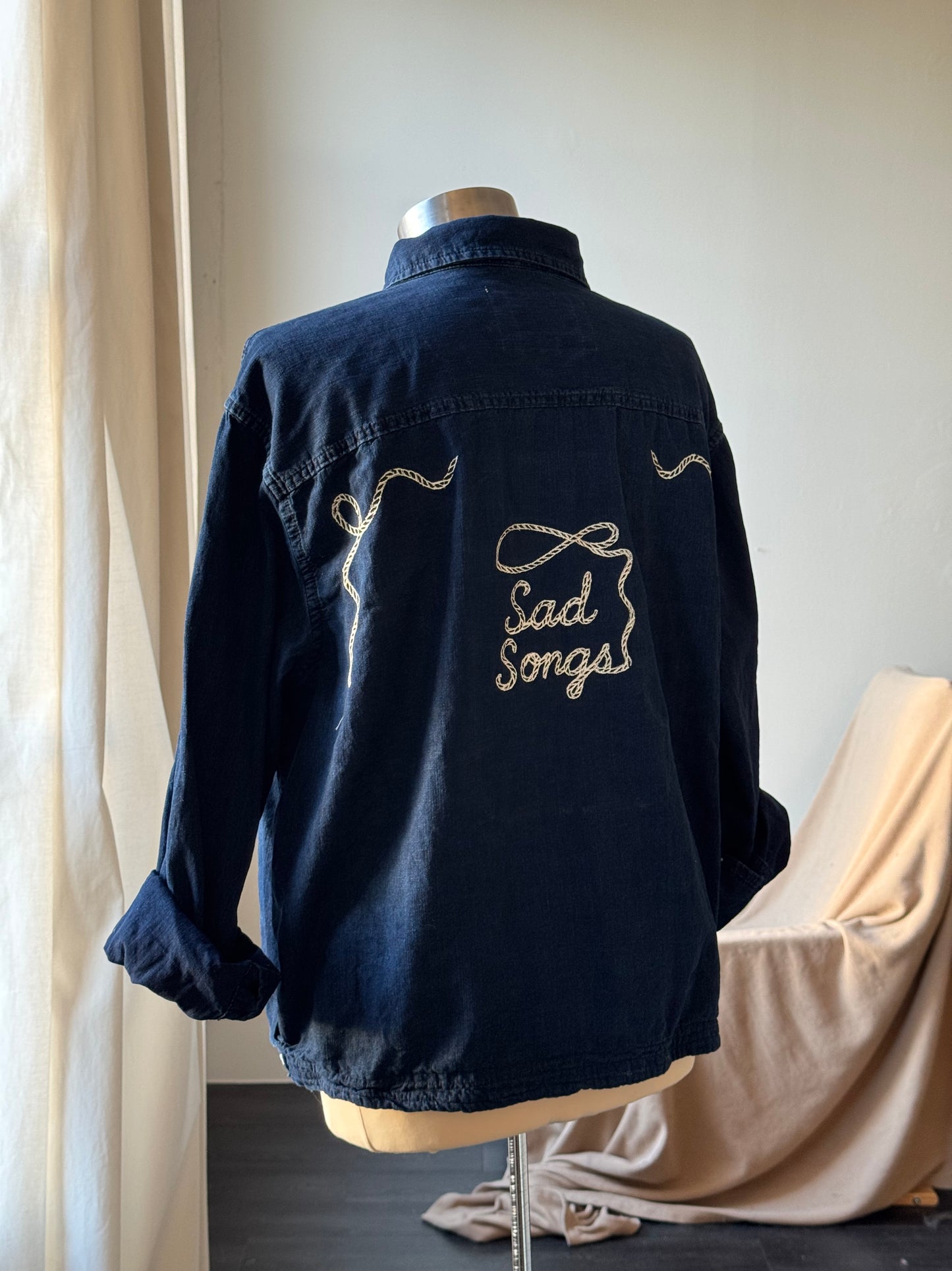 The Lawrence Handcrafted Sad Songs Cropped Cotton Button Down Long Sleeve
