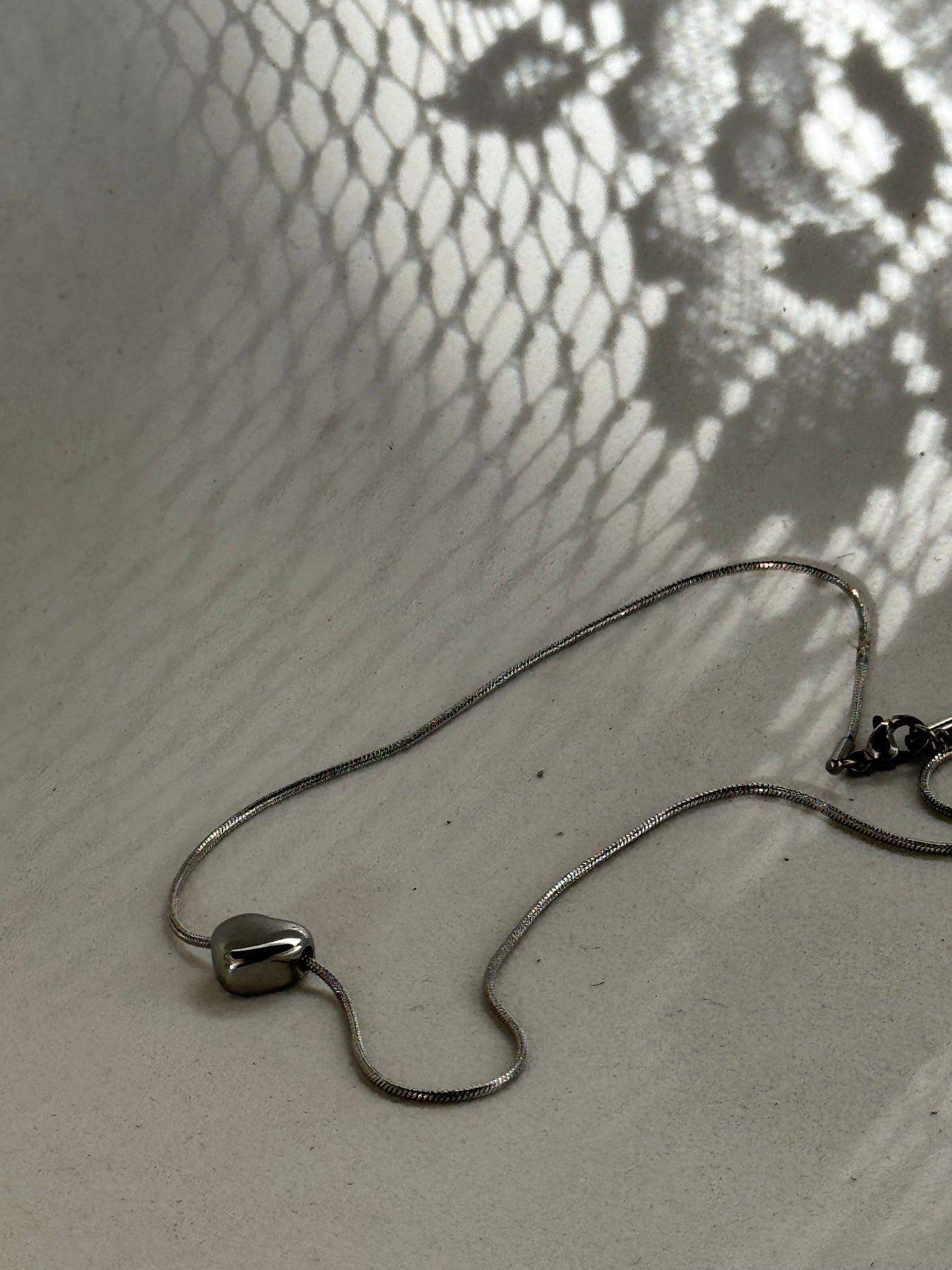 Sandy 18k Stainless Steel Waterproof  Heart Charm Necklace In White Gold Silver