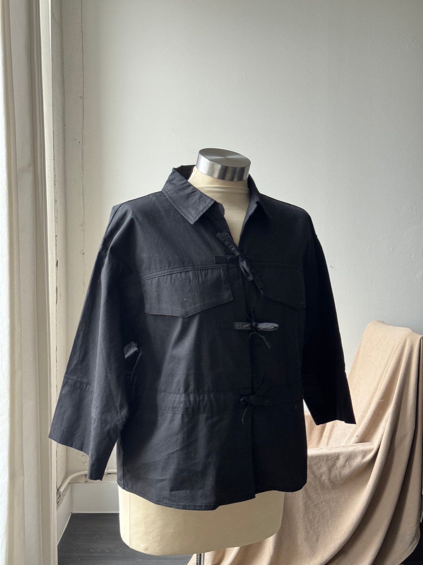 Robin Cotton 3/4 Sleeve Tie Front Top In Black