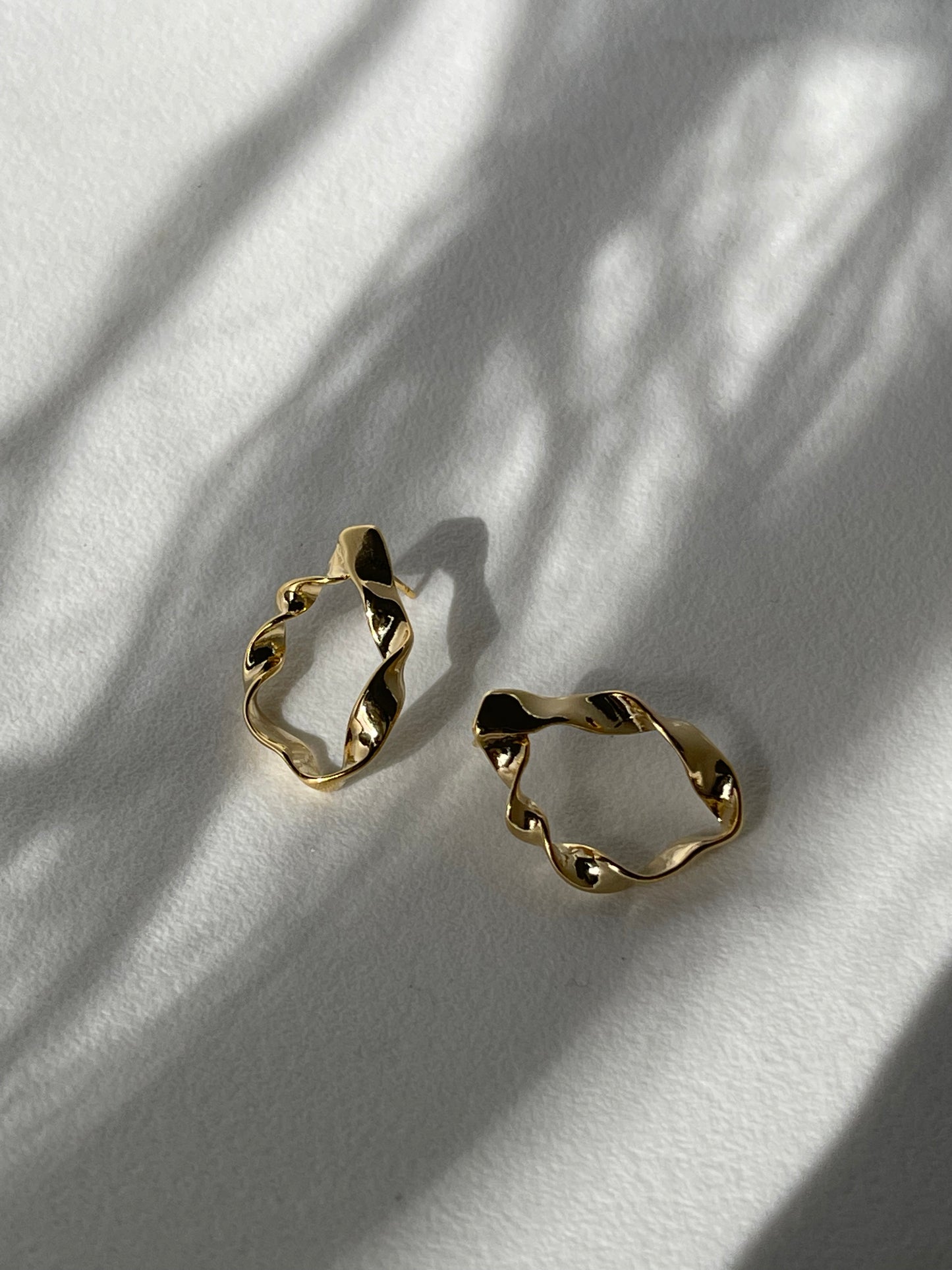 Organic Loose Twist Flat Hoop Earring In Gold