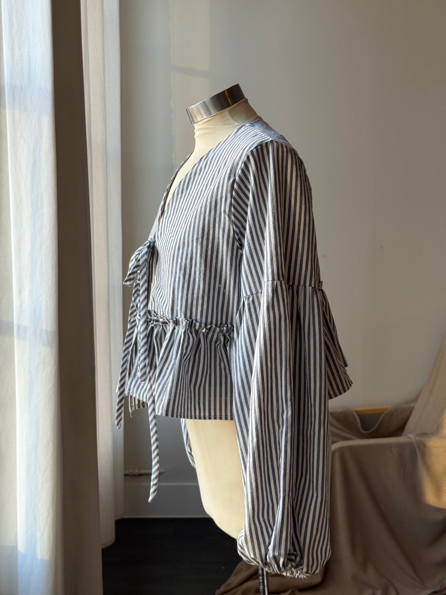 Florene Vintage Lantern Sleeve Ruffle Tie Front Top