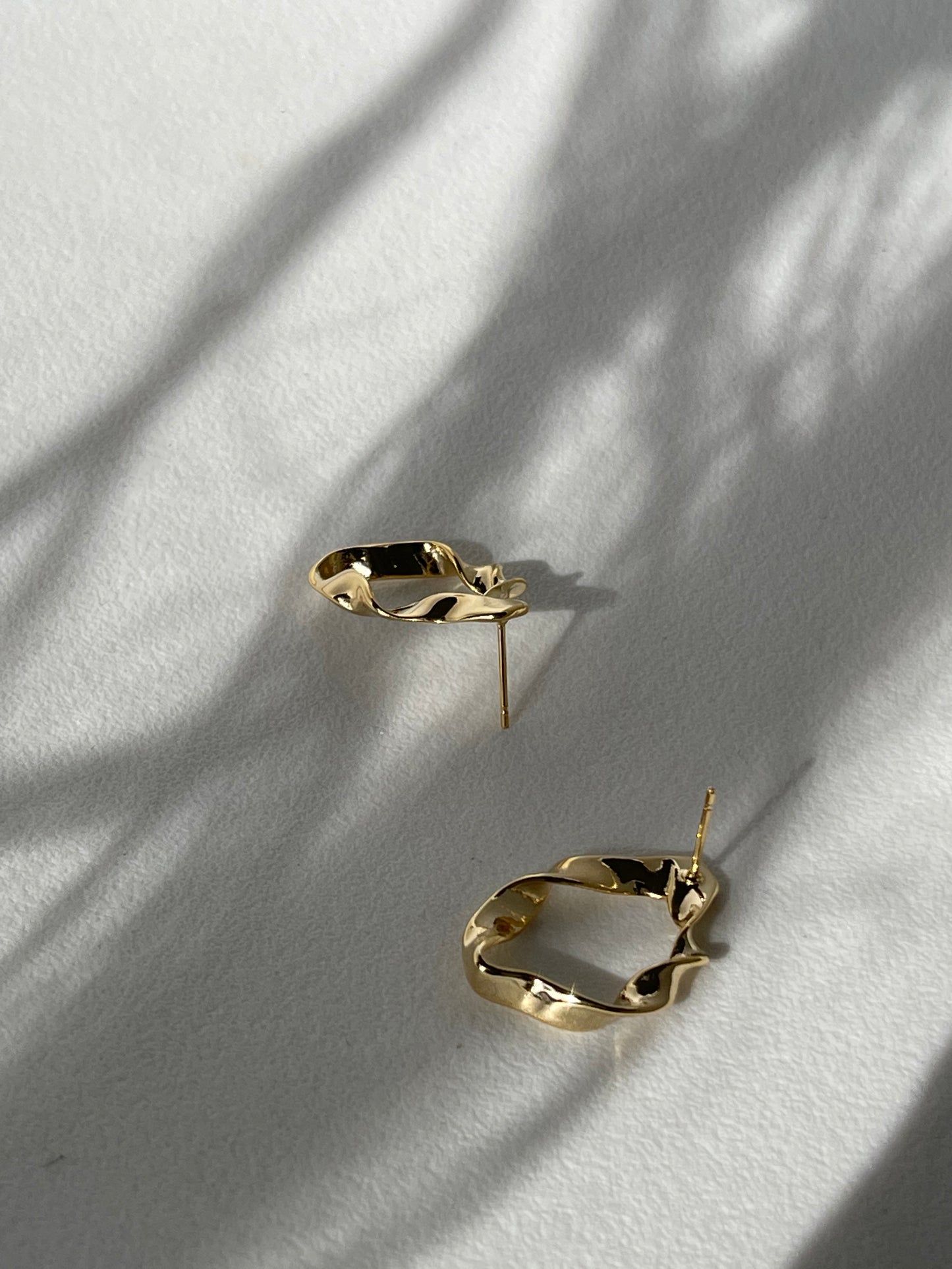 Organic Loose Twist Flat Hoop Earring In Gold