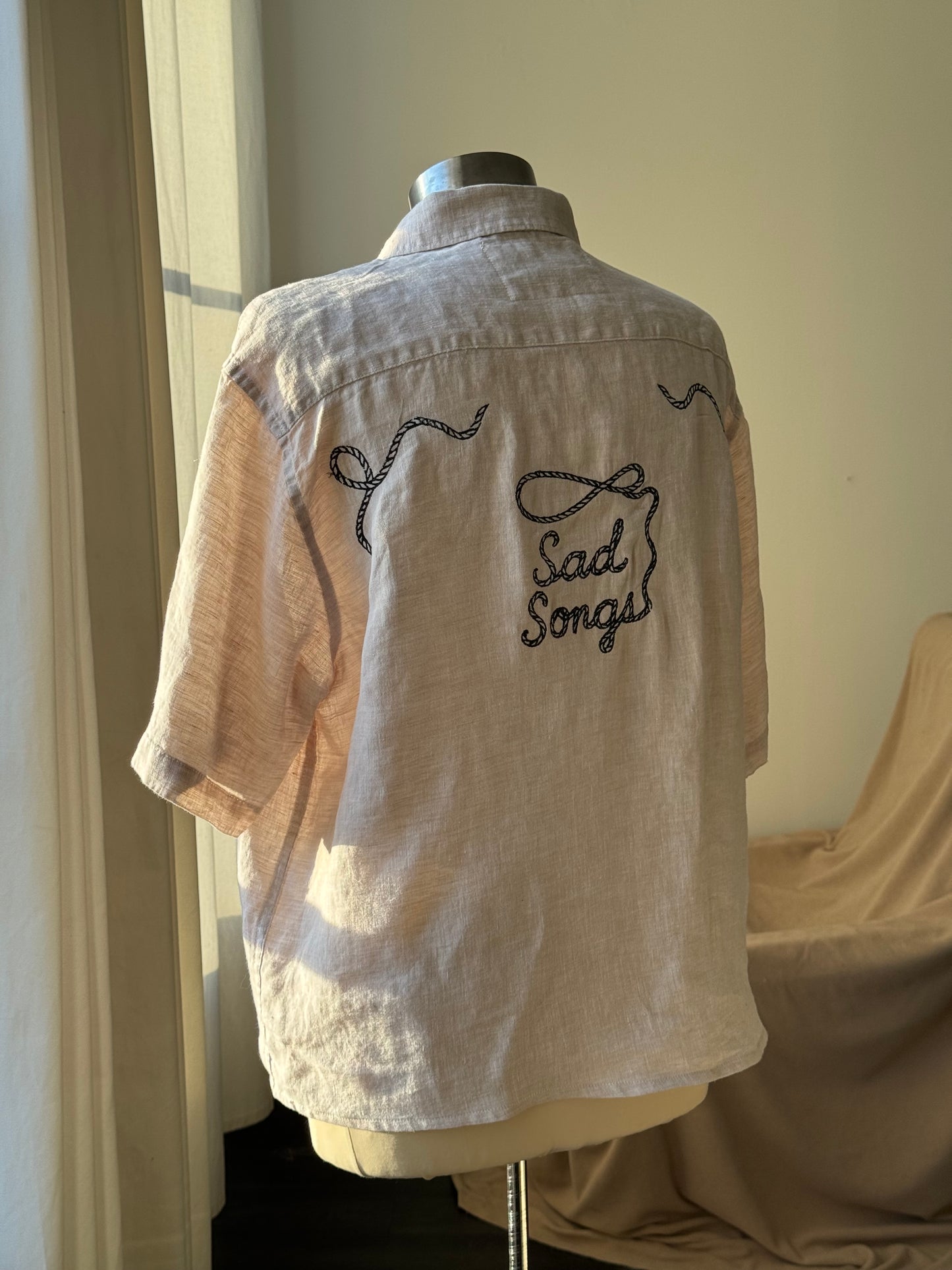 Judy Handcrafted Sad Songs Cropped Linen Button Down Short Sleeve In Natural