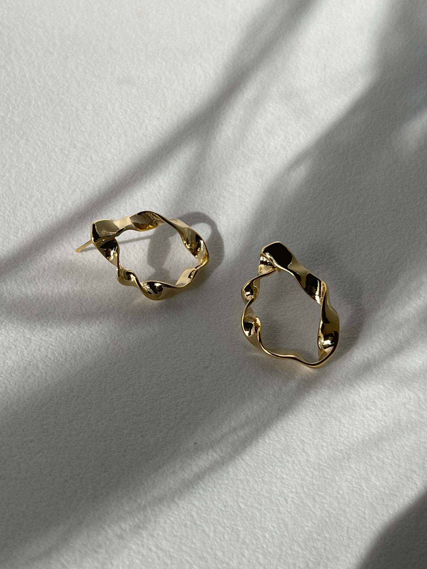 Organic Loose Twist Flat Hoop Earring In Gold