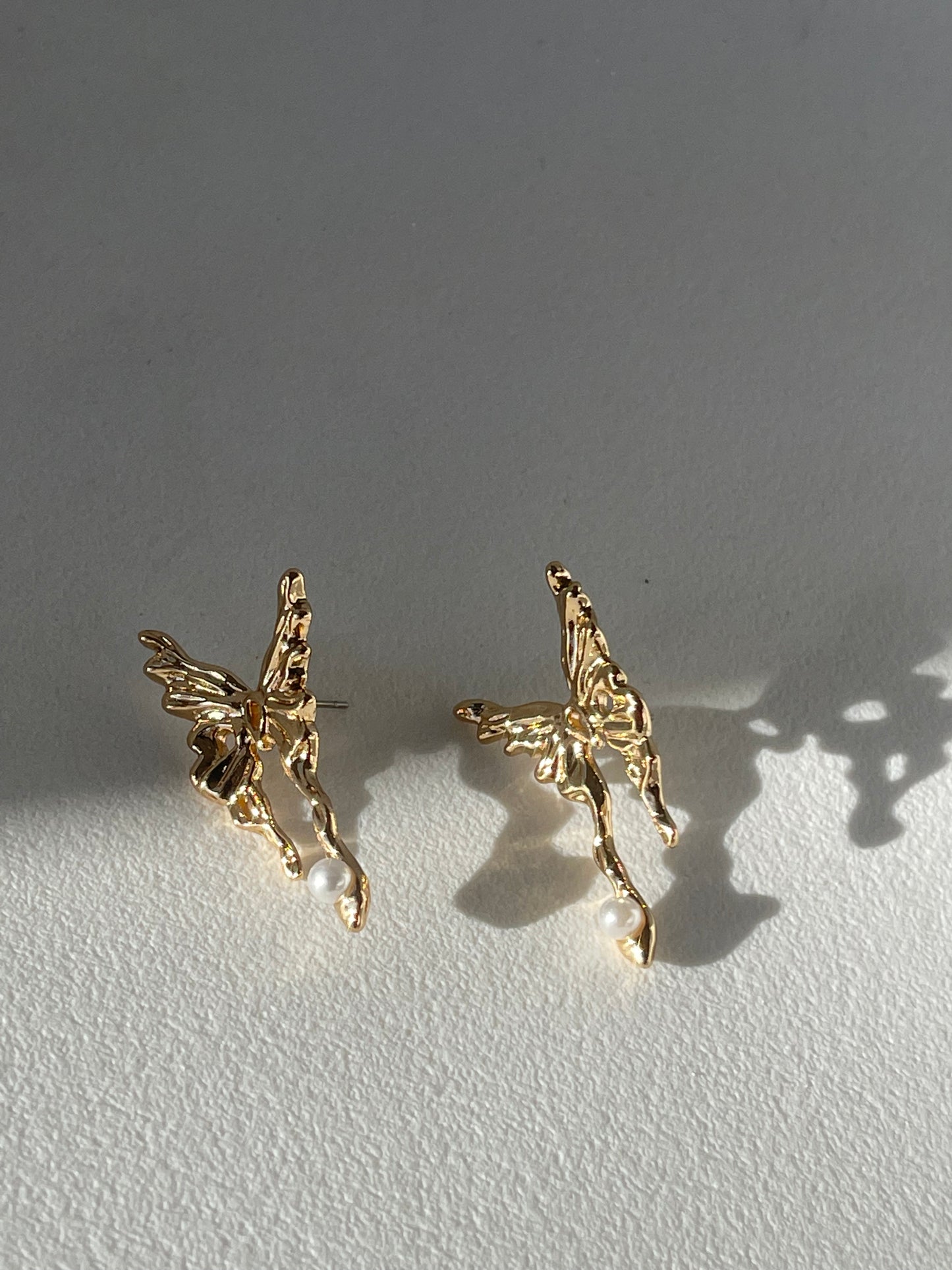 Madeline Stainless Steel ￼Melting Butterfly Pearl Drop Stud Earring In Gold