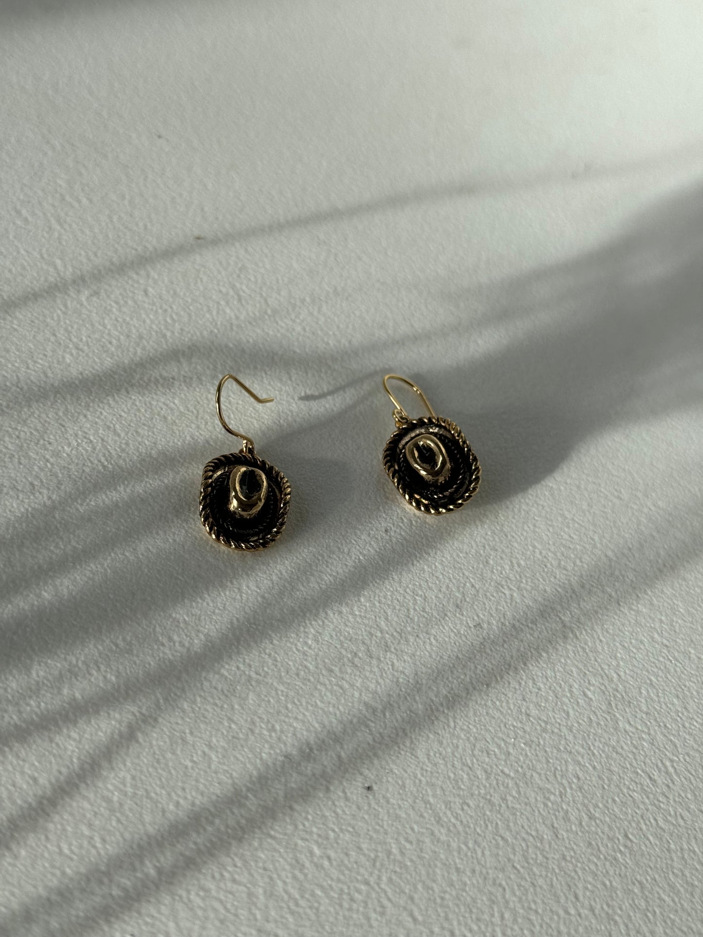 Cody Cowboy Hat Drop Earring In Antique Gold