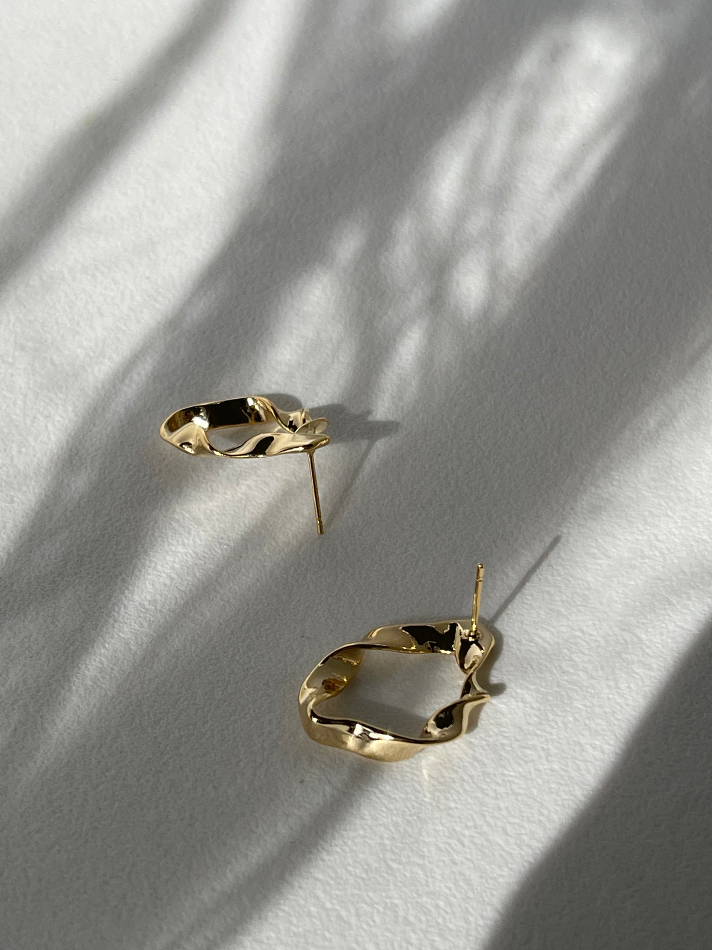 Organic Loose Twist Flat Hoop Earring In Gold