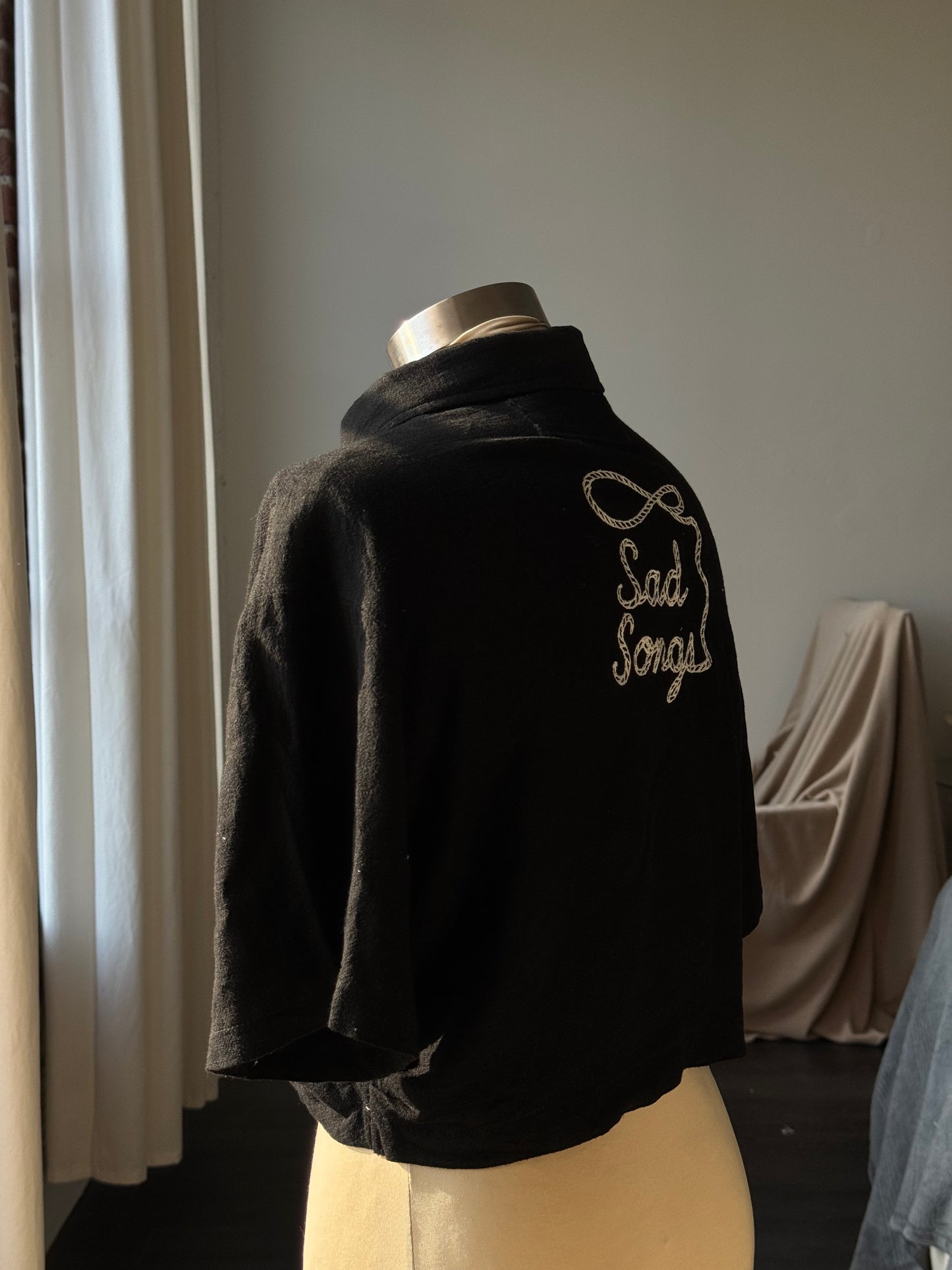 Judy Handcrafted Embroidered Sad Songs Cropped Button Down In Black