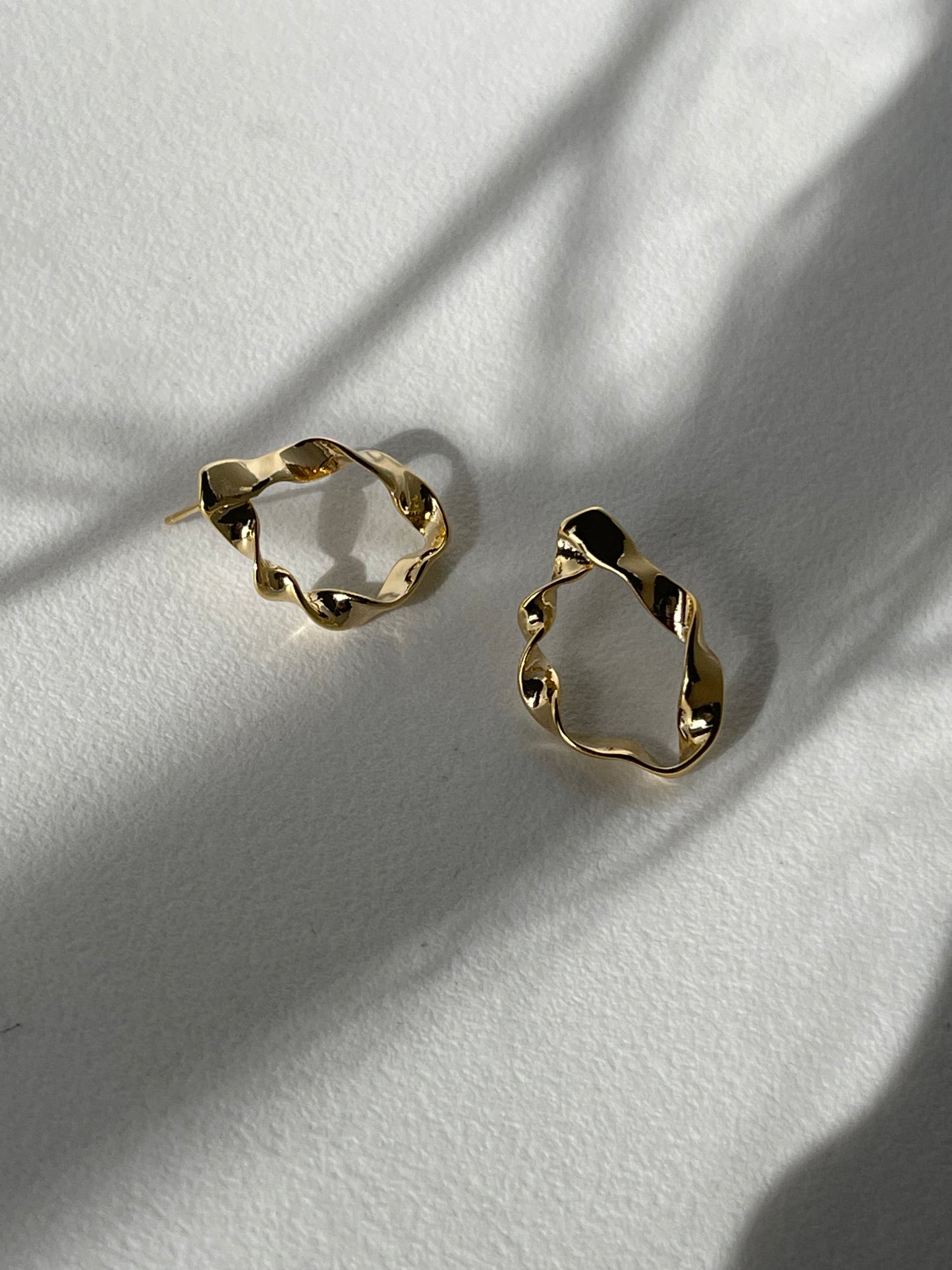 Organic Loose Twist Flat Hoop Earring In Gold